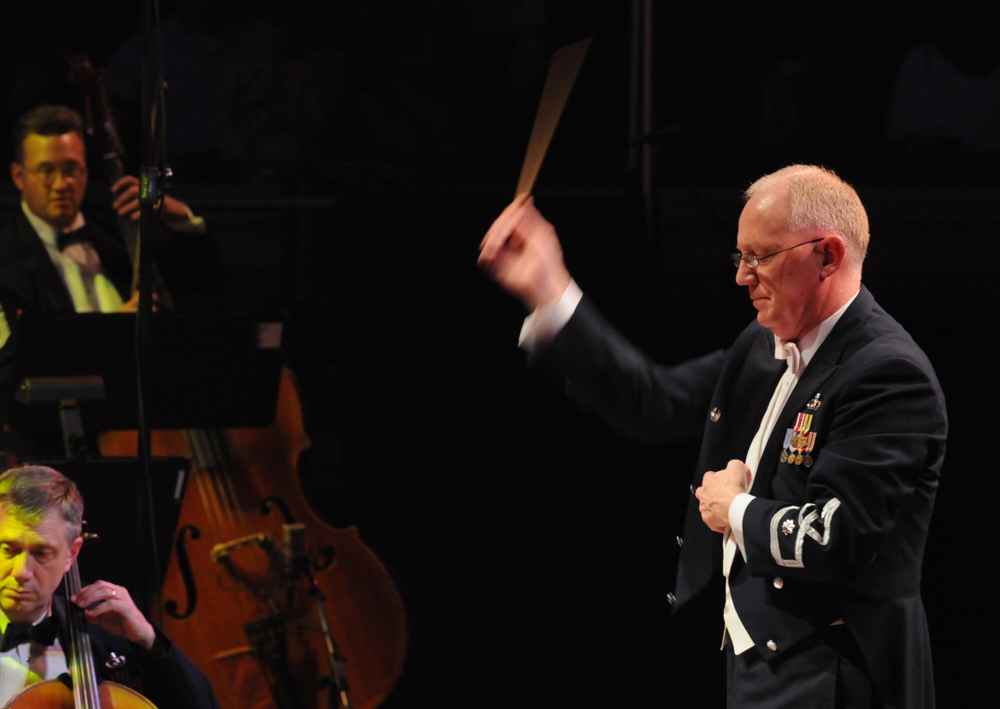Lt. Col. Alan Sierichs conducts the United States Air Force Band at the Daughters of the American Revolution Constitution Hall in Washington as part of the Air Force Band’s Guest Artist Series March 21. The Guest Artist Series features a variety of performers throughout the year. The Band's Guest Artist Series is free of charge and open to the public. For more information, visit the U.S. Air Force Band’s website at www.usafband.af.mil. (U.S. Air Force photo by Senior Airman Sean Adams)