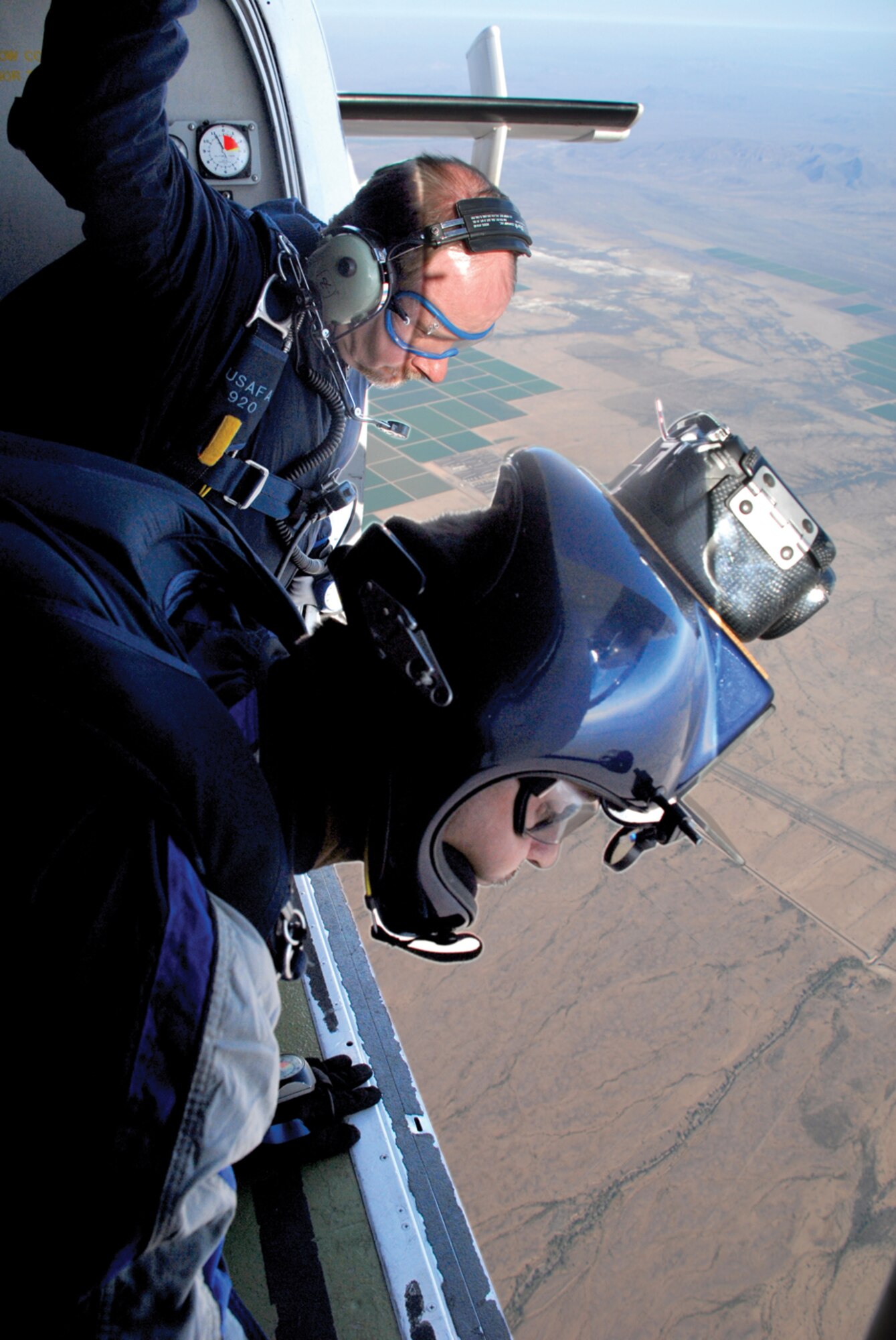 A videographer jumped with each team of tandem jumpers, and the video was presented to them after their jump. (U.S. Air Force photo/ Airman 1st Class Tracie Forte)