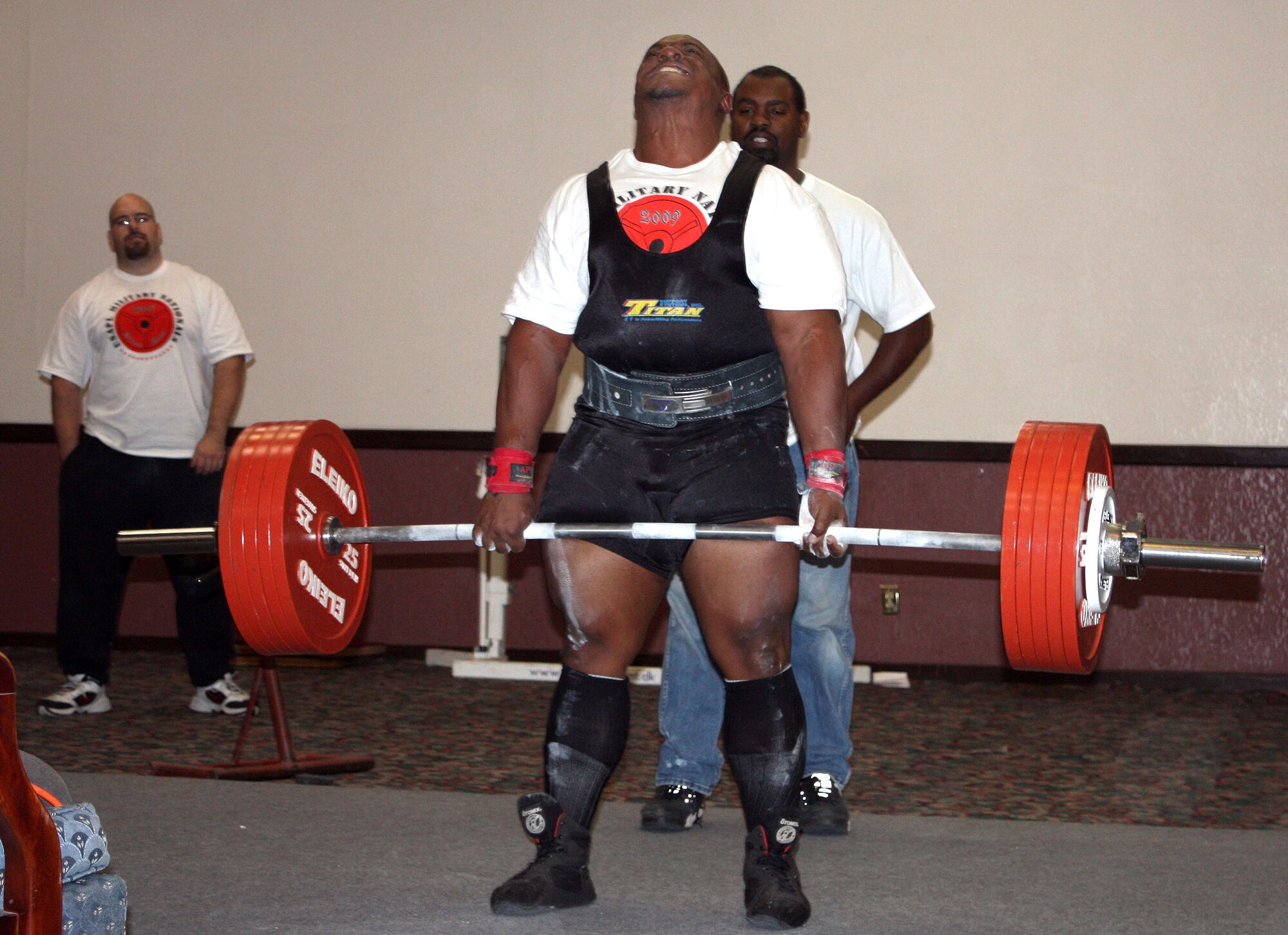 Mr. Andre Gholson, nurse consultant, 59th Medical Wing Critical Care Air Transport Team, attempts to dead lift over 600 pounds during a USA Power Lifting Military Nationals competition in Killeen, Texas March 14. (Courtesy Photo/ Cinzia Davenport) 