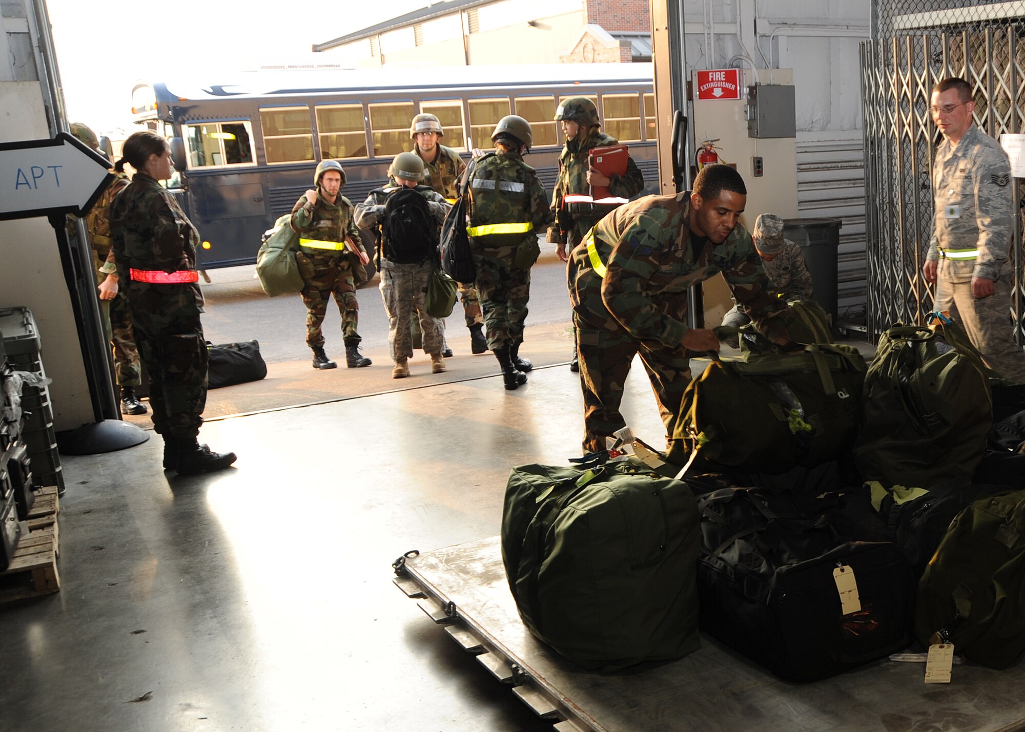 SCOTT AIR FORCE BASE, Ill. --Wing members load mobility bags onto an aircraft pallet in preparation for deployment to the exercise location. (U.S. Air Force photo/Airman 1st Class Wesley Farnsworth)