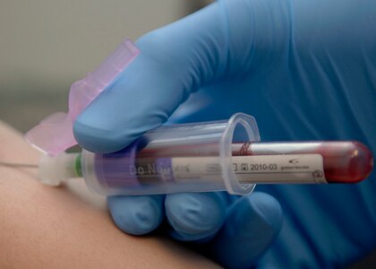 Senior Airman Alex Hastings takes a patient's blood for annual human immunodeficiency virus and cholesterol testing at the clinical laboratory on Charleston AFB, March 23. The lab receives more than 500 blood and urine samples weekly. Airman Hastings is a laboratory technician with the 437th Medical Group. (U.S. Air Force photo/Senior Airman Katie Gieratz)