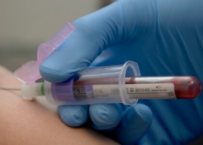 Senior Airman Alex Hastings takes a patient's blood for annual human immunodeficiency virus and cholesterol testing at the clinical laboratory on Charleston AFB, March 23. The lab receives more than 500 blood and urine samples weekly. Airman Hastings is a laboratory technician with the 437th Medical Group. (U.S. Air Force photo/Senior Airman Katie Gieratz)