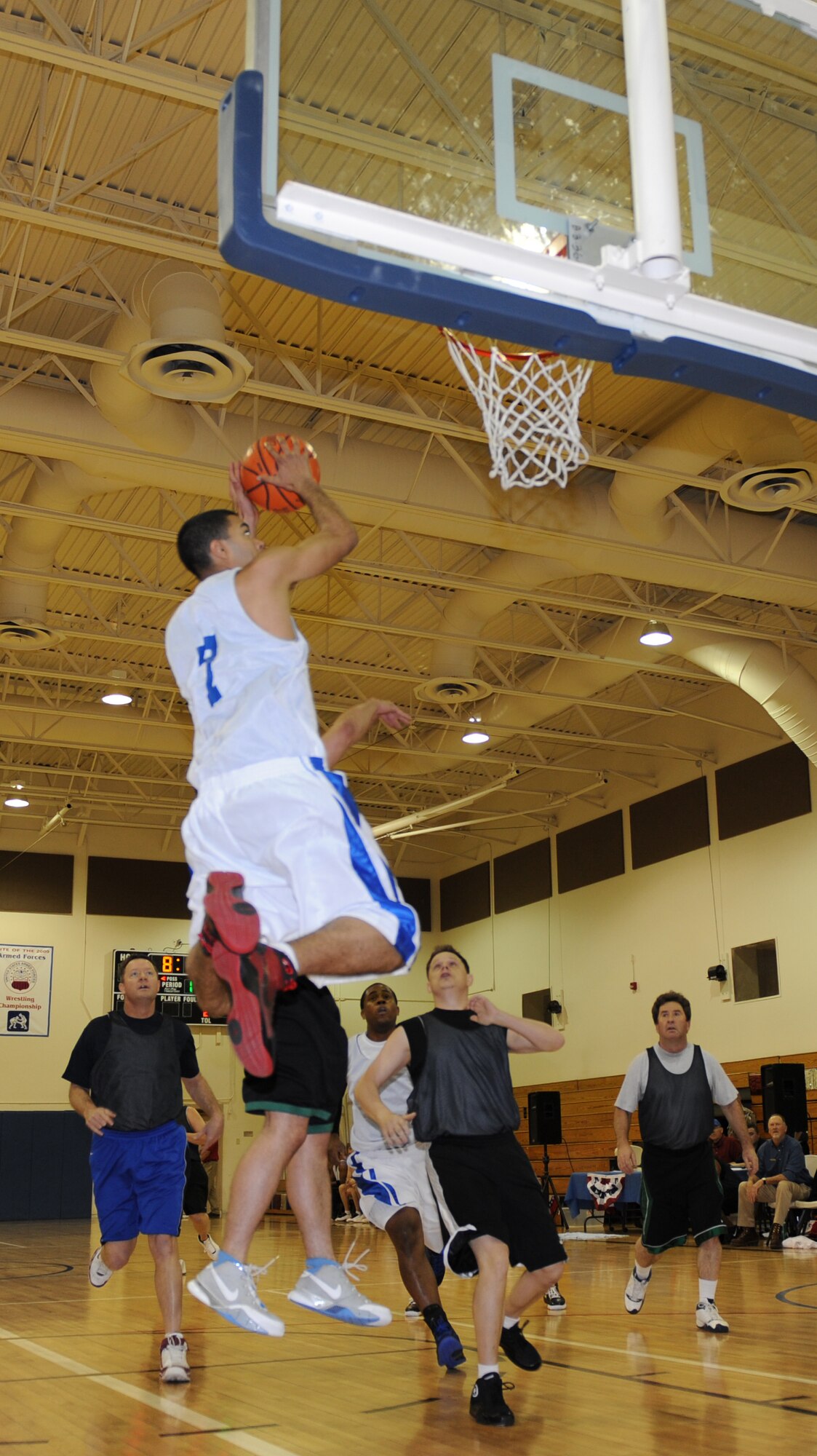 MOUNTAIN HOME AIR FORCE BASE, Idaho -- Patrick McIntyre, intramurals all-star team, dunks the ball during the All Star Basketball Extravaganza at the Gunfighter Fitness Center March 20. The intramurals all-star team defeated the over 30 all-star team 61 to 43. (U.S. Air Force photo/Airman 1st Class Renishia Richardson)