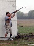 Army Staff Sgt. Randy Nantz, a security forces member injured while deployed to Iraq, takes aim at clay targets while skeet shooting at the Randolph Skeet Range on March 24. Several injured servicemembers were invited out for a barbecue lunch and the opportunity to squeeze off a few rounds at skeet. (U.S. Air Force photo by Steve White)