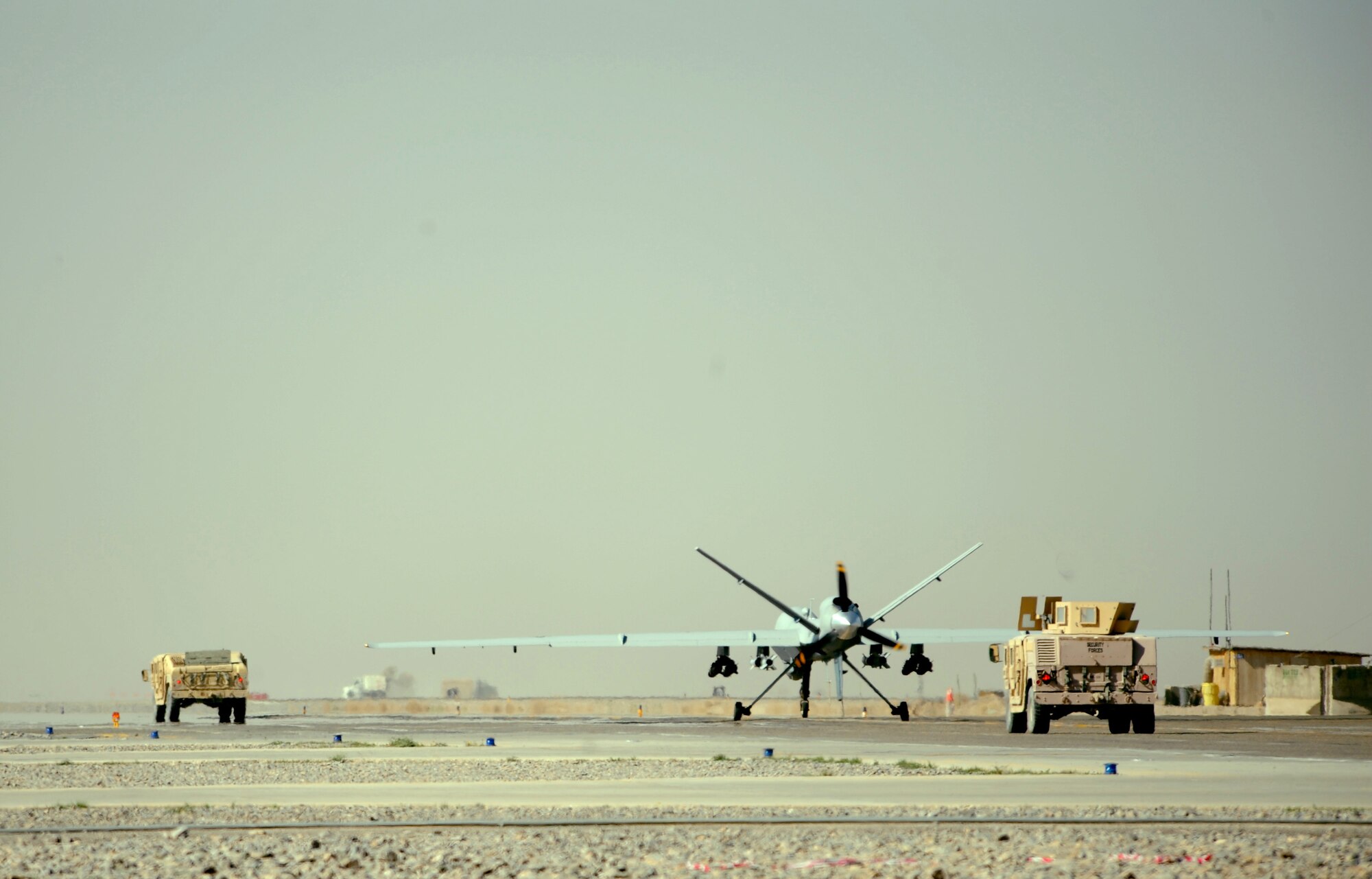 A U.S. Air Force MQ-9 Reaper from the 62nd Expeditionary Reconassiance Squadron taxis for take off from Kandahar Air Base, Afghanistan, March 13, 2009, in support of Operation Enduring Freedom.  (U.S. Air Force photo by Staff Sgt. James L. Harper Jr.)