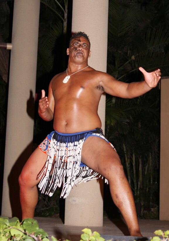 A member of the Hale Koa Hotel luau cast performs as a New Zealand native warrior. The luau features dances and traditions from Samoa, Hawaii, New Zealand and Tahiti.