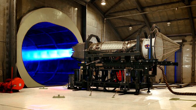 A Pratt & Whitney F119-PW-100 turbofan engine undergoes a routine performance test at the Holloman AFB Jet Engine Test Facility 17 March. The test facility is commonly referred to as the "hush House" because it allows engines to be run at full afterburner, as shown here, with minimal noise being allowed outside the facility. (U.S. Air Force Photo/TSgt Chris Flahive)
