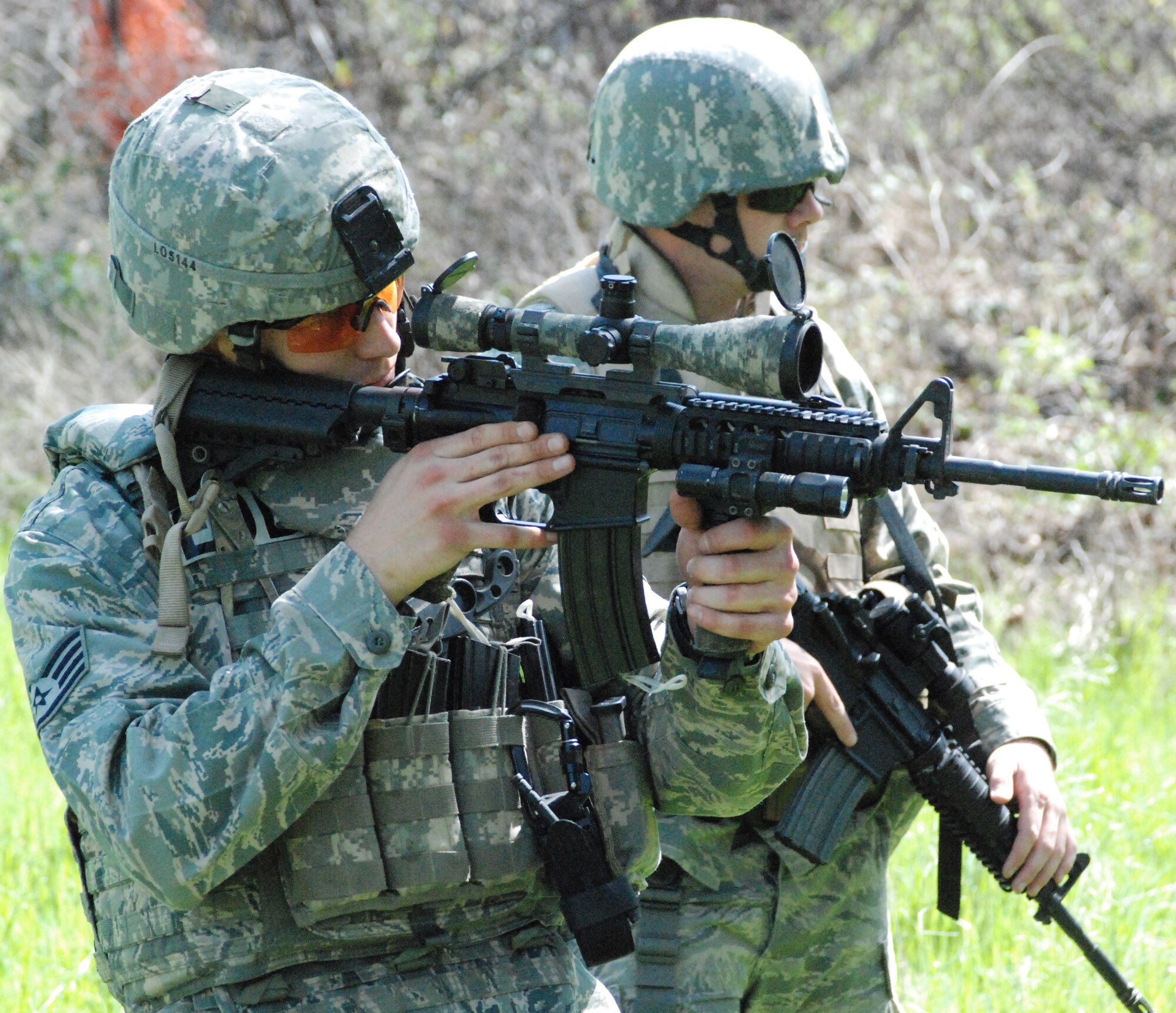 Staff Sgt. Scott Love zeroes in on a weapons cache March 24 as part of a training exercise. The EOD flight trains in nine different mission areas to hone their skills. (Photo by Airman 1st Class Chuck Broadway)
