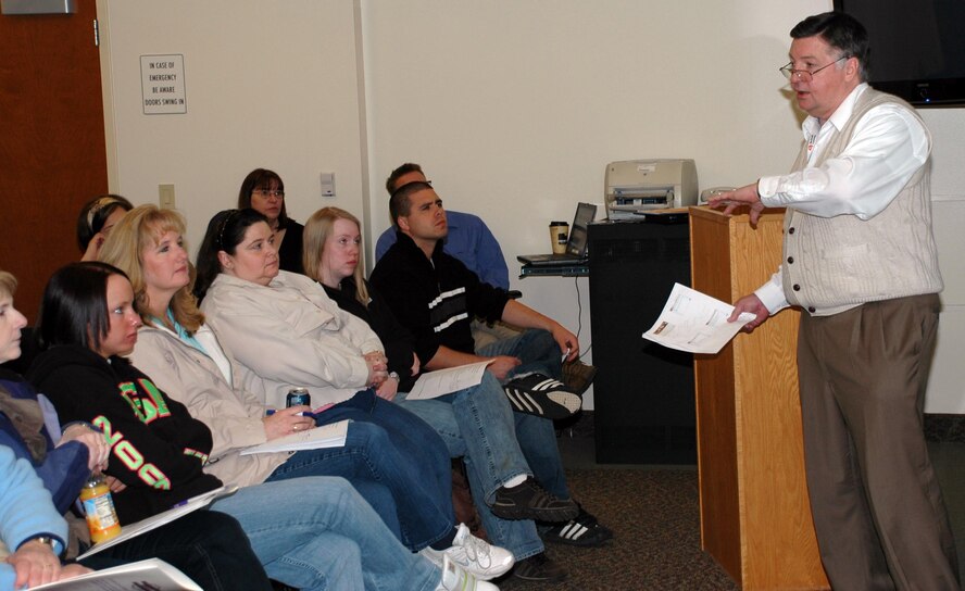 Don Norman, Military Family Life Consultant, discusses coping mechanisms during the Yellow 
   Ribbon briefing at the Fitness Center March 7.