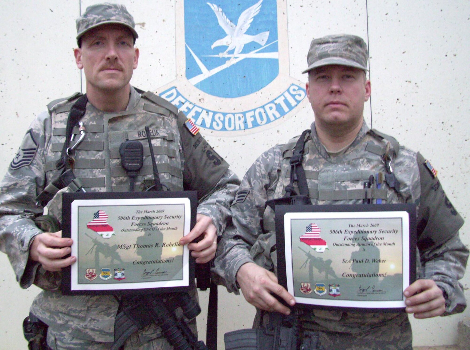 Two deployed 934th Security Forces Squadron  members were named Outstanding Airmen of the Month for March 2009 for the 506th Expeditionary Security Forces Squadron in Southwest Asia.

Master Sgt. Thomas Robelia (left) was named Outstanding Senior NCO of the Month and Senior Airman Paul Weber was named Outstanding Airman of the Month. (Courtesy photo)