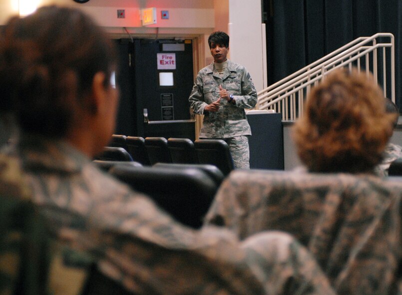Chief Master Sgt. Cathy Johnson, 8th Fighter Wing command chief master sergeant, speaks during the Womens History Seminar at Kunsan Air base, Republic of Korea, March 25. The seminar included such topics as Making Responsible Choices, Sexual Assault Response Coordinator issues, 'We've Come a Long Way,' Protocol and Etiquette, How to Become Successful in Todays Military, and a Leadership Panel. Women's History Month is celebrated throughout the month of March to highlight women and their accomplishments throughout the years. (U.S. Air Force Photo/Senior Airman Gustavo Gonzalez)