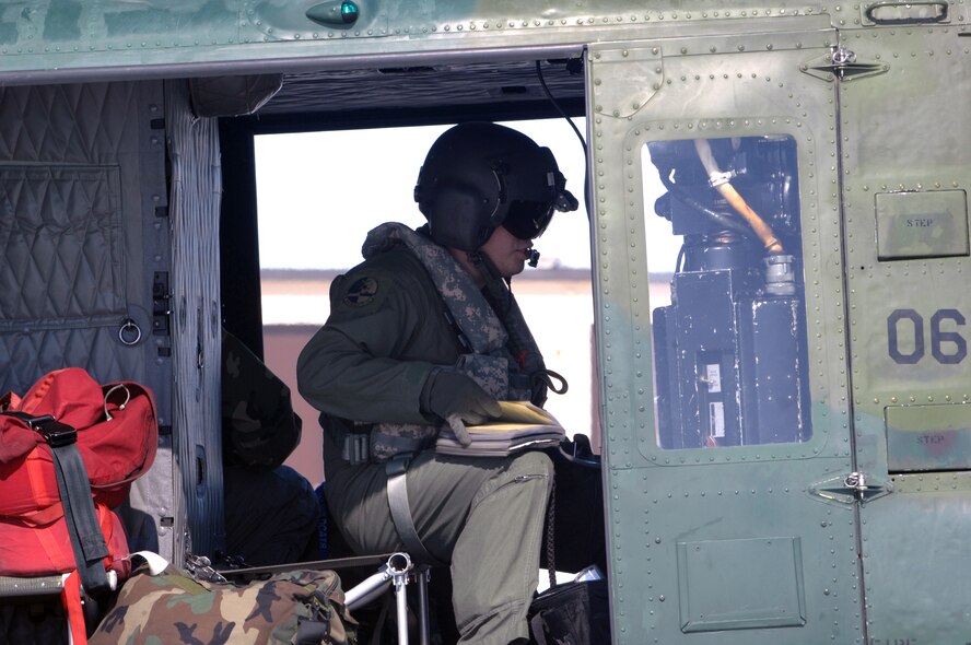 MINOT AIR FORCE BASE, N.D. -- A UH-1N “Huey” helicopter returns to Minot Air Force base today for a crew swap before heading to Grand Forks, ND, to assist in flood relief efforts in the Fargo area.  Two hoist-equipped "Hueys" from the 91st Missile Wing are part of an interagency task force providing search and rescue and support services in flood-affected areas of North Dakota. (U.S. Air Force photo by Airman 1st Cass Jesse Lopez)

 
