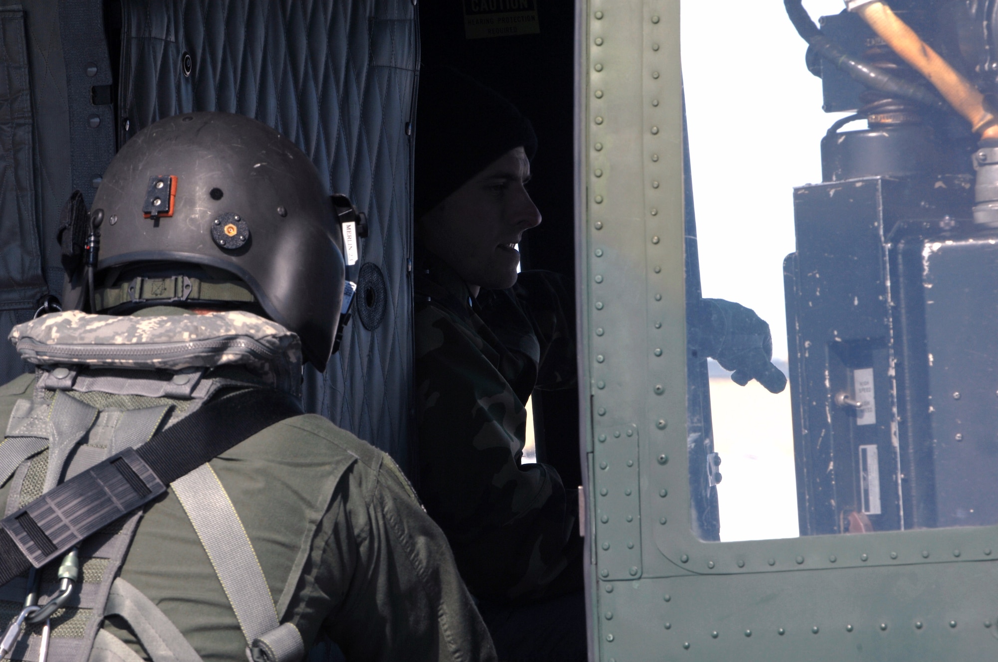 MINOT AIR FORCE BASE, N.D. -- A UH-1N “Huey” helicopter returns to Minot Air Force base today for a crew swap before heading to Grand Forks, ND, to assist in flood relief efforts in the Fargo area.  Two hoist-equipped "Hueys" from the 91st Missile Wing are part of an interagency task force providing search and rescue and support services in flood-affected areas of North Dakota. (U.S. Air Force photo by Airman 1st Cass Jesse Lopez)

 
