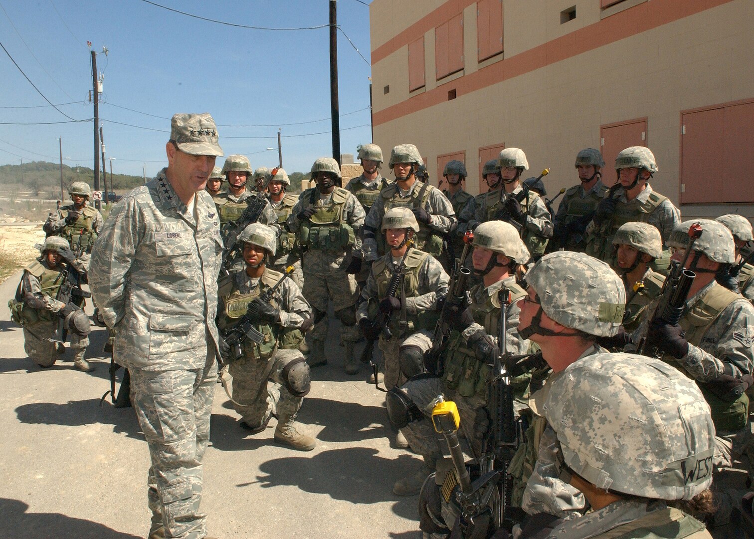 3/20/2009 - Gen. Stephen Lorenz, commander, Air Education and Training Command, talks with students in the Security Forces Apprentice School at Camp Bullis March 20. The students were in their first day of Military Operations in Urban Terrain, or MOUT, training. General Lorenz's visit to Camp Bullis and his two-day trip to Lackland was part of his initial immersion of all Air Education and Training Command bases after taking command in 2008. (USAF photo by Alan Boedeker)