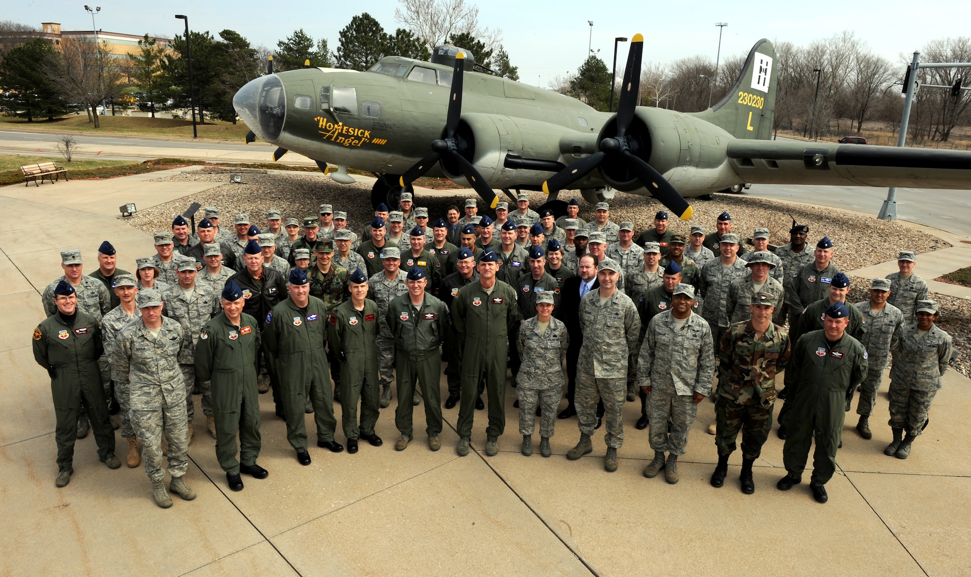 OFFUTT AIR FORCE BASE, Neb. -- 55th Wing leadership from around the globe pose for a group photo in front of a B-17 static display. The leaders gathered at Offutt March 26-28 for the annual 55th Wing Commanders Conference. The conference was an opportunity for 55th WG Commander Brig. Gen. Jim Jones to meet with all of his unit commanders and superintendents to discuss current issues facing his troops whether they are here at Offutt or in various time zones around the world. 

U.S. Air Force Photo by Josh Plueger
