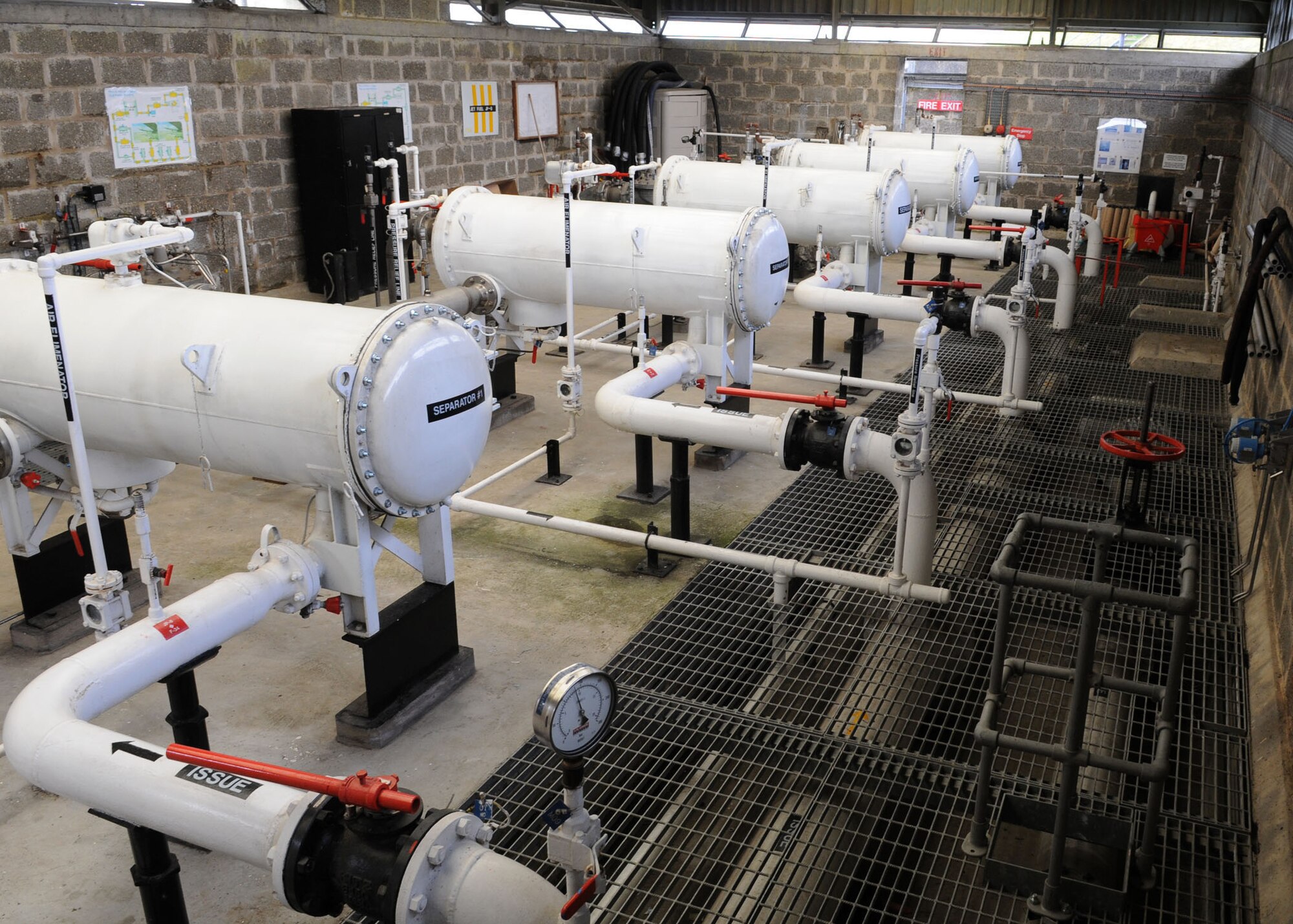 The 100th Logistics Readiness Squadron’s petroleum, oils, and lubricants section operates and maintains the fuel filter separator sumps at each station at RAF Mildenhall, England. Each station operates five fuel filter separators that are able to filter through 600 gallons of aircraft fuel per minute, enabling reliable usable fuel that is available 24 hours a day. (U.S. Air Force photo by Staff Sgt. Jerry Fleshman)