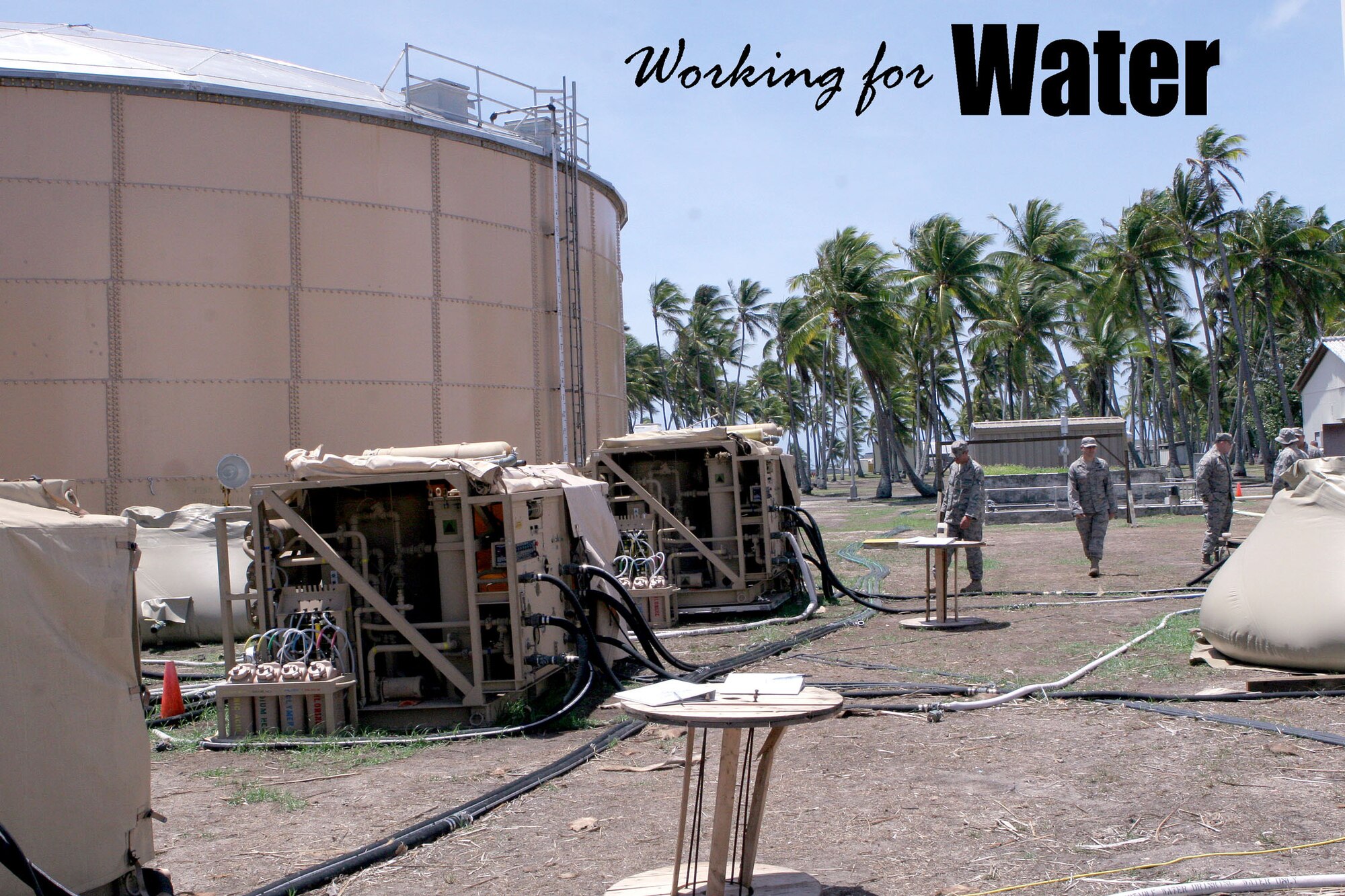 Pacific Air Forces Airmen monitor reverse osmosis machines used for removing particles, sediment and salt from water at Roi-Namur, an island in the  Kwajalein Atoll. The team is deployed to the island to provide clean drinking water to the island's residents.
(Photo courtesy of Dan Adler) 