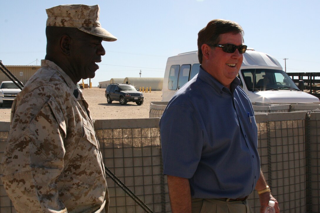 Sgt. Maj. Jerome Alford, Mojave Viper’s Support Detachment sergeant major, speaks to Ken Calvert, a member of the United States House of Representatives since 1993, during his tour of the Combat Center’s training facilities March 28.
