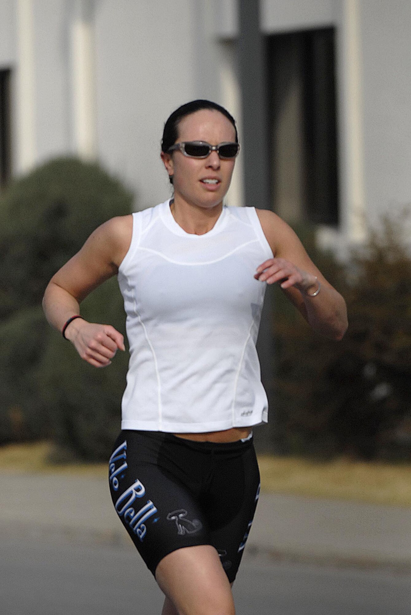 Capt Rebecca Gross runs past a intersection during the United States Army Garrison Humphreys Sprint Triathlon March 21st. Capt Gross is a readiness officer for the 607th Air Operations Center at Osan Air Base, Republic of Korea. (U.S. Air Force photo/Master Sgt. Marlin Zimmerman)