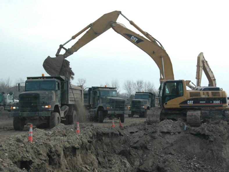 North Dakota National Guardsmen work on flood duty to combat the rising Red River in Fargo, North Dakota.  Over 3,000 soldiers and airmen from North Dakota and surrounding states work together to keep the state safe.  