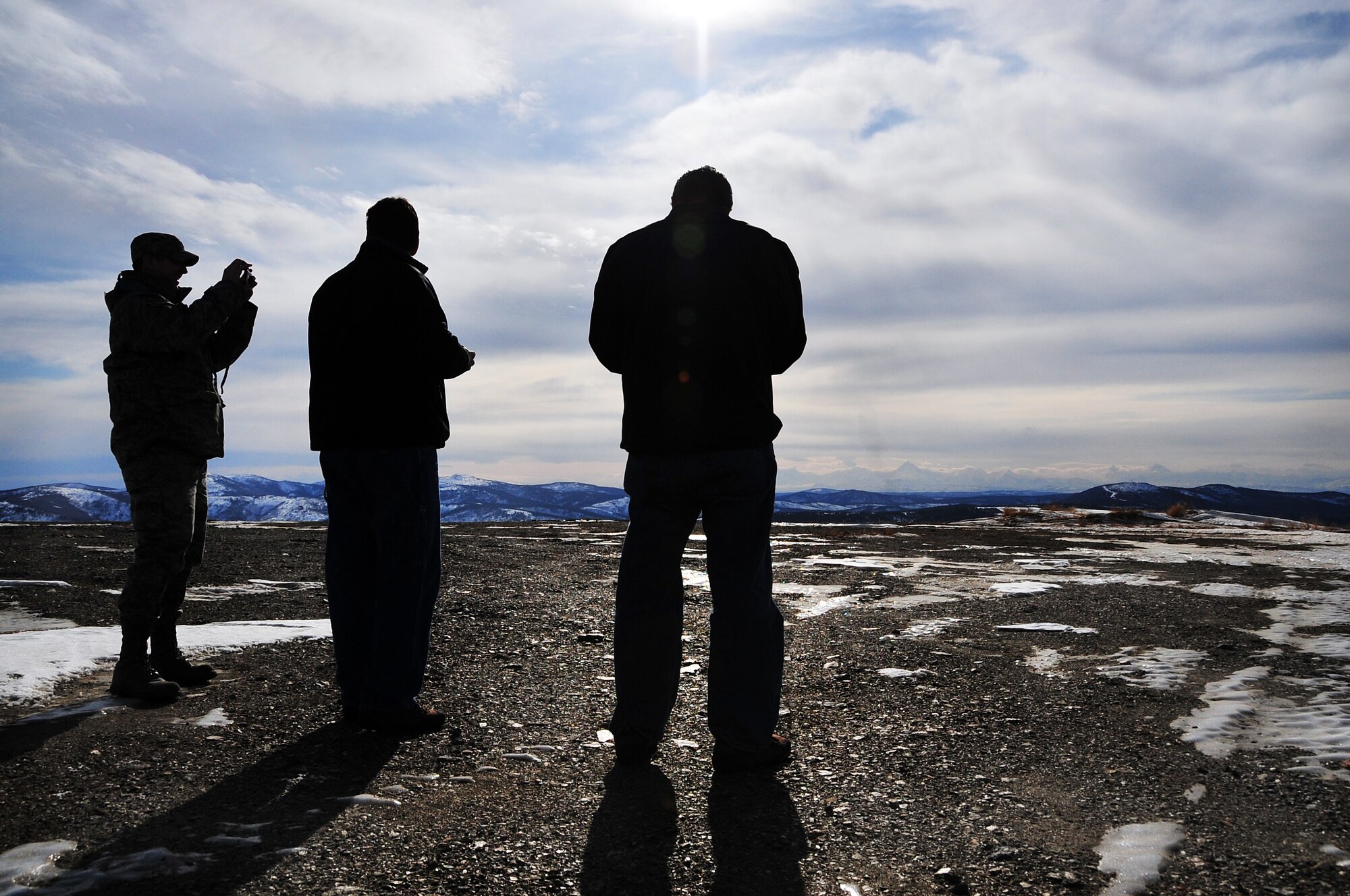 Private contractors from Lackland Air Force Base, Texas, take photos and Global Positioning System coordinates for possible ground target sites March 25, 2009, Eielson Air Force Base, Alaska. The targets will be used for upcoming Red Flag-Alaska exercises and will help provide more realistic training for participating pilots.  (U.S. Air Force photo/Airman 1st Class Willard E. Grande II)