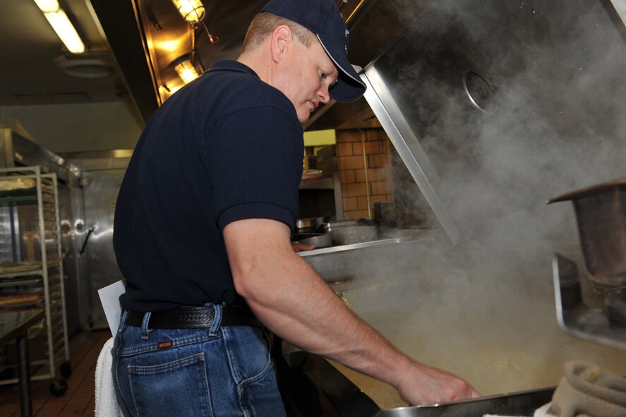 OFFUTT AIR FORCE BASE, Neb. -- Chief Master Sgt. Michael Thoreson, a member of the 55th Maintenance Group, scrambles eggs in preparation for the Offutt Chiefs Group Pancake Feed at the Patriot Club March 25. Proceeds from the bi-annual event benefit a variety of local events and organizations including the 55th Wing Birthday Ball, Airman Leadership School and Community College of the Air Force scholarships. 
U.S. Air Force photo by Charles Haymond