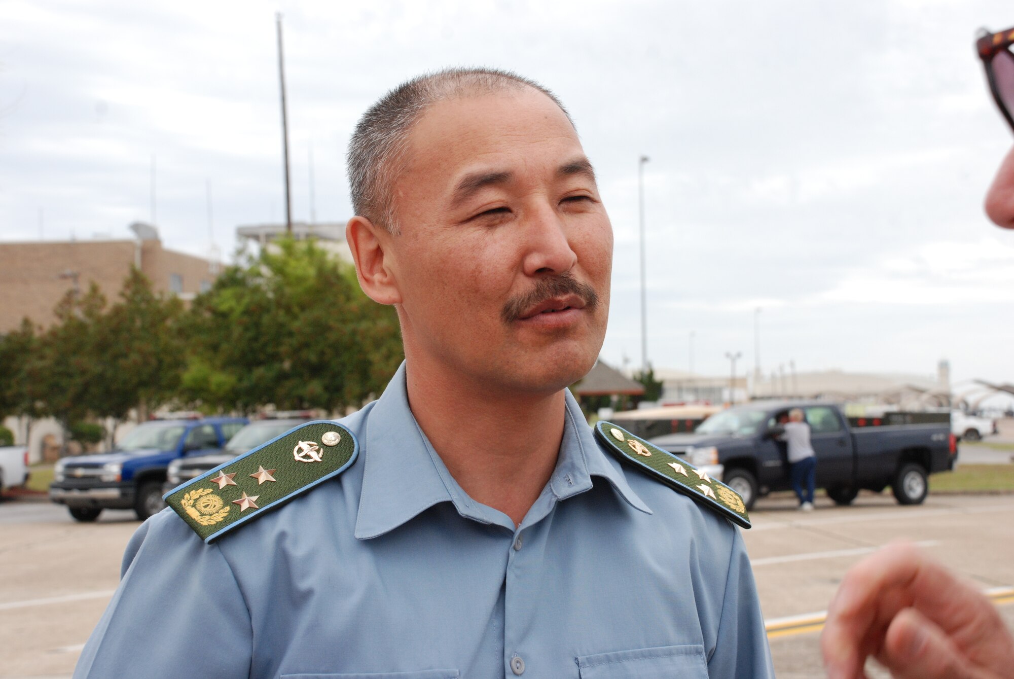 EGLIN AIR FORCE BASE, Fla.--Kyrgyzstan air force Col. Abdila-Akin Ataev, an Air traffic control officer with the Kyrgyzstan air force, speaks with his interpreter during his visit here. The officers were at the base for a three-day tour of the air traffic control and operation facilities. (U.S. Air Force photo/Staff Sgt. Mike Meares)