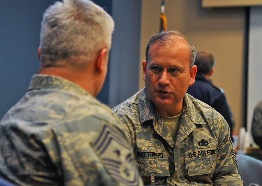 Chief Master Sgt. Pat Battenberg,  Command Chief Master Sergeant, 79th Medical Wing, speaks 89th Airlift Wing Command Chief Master Sgt.  Robert Sealey at a open house explaining Joint Task Force National Capitol Region Medical and Base Closure and Realignment (BRAC) effects on beneficiaries  in the National Capital Region, March 26, 2009 at Malcolm Grow Medical Center on Andrews Air Force Base, Md.   (U.S. Air Force photo by Tech. Sgt. Suzanne M. Day)(Released)

