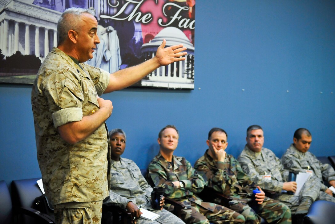 Command Master Chief Robert Elliott speaks at a 79th Medical Wing hosted  informational open house for Chief Master Sergeants, First Sergeants and other enlisted leaders to explain Joint Task Force National Capitol Region Medical and Base Closure and Realignment (BRAC) effects on beneficiaries  in the National Capital Region, March 26, 2009 at Malcolm Grow Medical Center on Andrews Air Force Base, Md.   (U.S. Air Force photo by Tech. Sgt. Suzanne M. Day)(Released)

