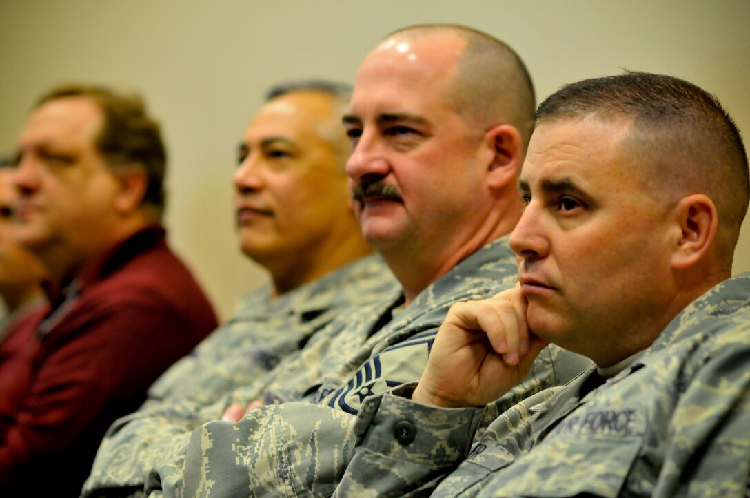 Senior Master Sgts. Michael Turner and Chris Rhoney listen to Chief Master Sgt. Pat Battenberg,  Command Chief Master Sergeant, 79th Medical Wing at a informational open house for Chief Master Sergeants, First Sergeants and other enlisted leaders to explain Joint Task Force National Capitol Region Medical and Base Closure and Realignment (BRAC) effects on beneficiaries  in the National Capital Region, March 26, 2009 at Malcolm Grow Medical Center on Andrews Air Force Base, Md.   (U.S. Air Force photo by Tech. Sgt. Suzanne M. Day)(Released)

