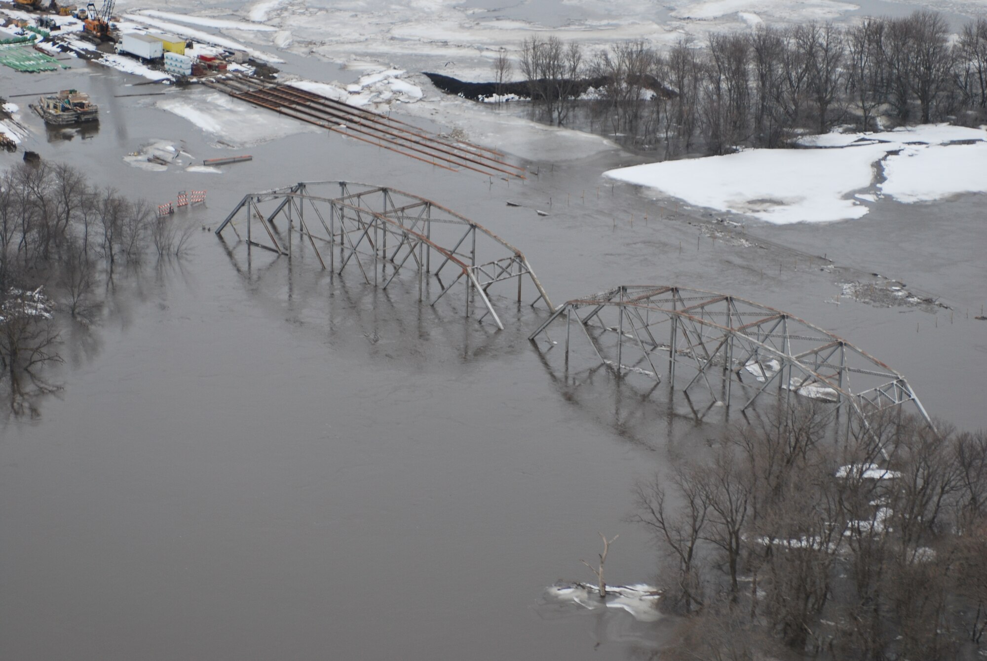 FARGO, N.D. -- A bridge on the Red River, north of Fargo, N.D., sits under water due to the recent flooding of the river here March 29. Currently, the 54th Helicopter Squadron from Minot AFB has two UH-1N "Huey" crews at Grand Forks AFB, N.D., on alert to provide search and rescue missions in support of flood relief along the Red River. (U.S. Air Force photo by Airman 1st Class Joshua Rosales)