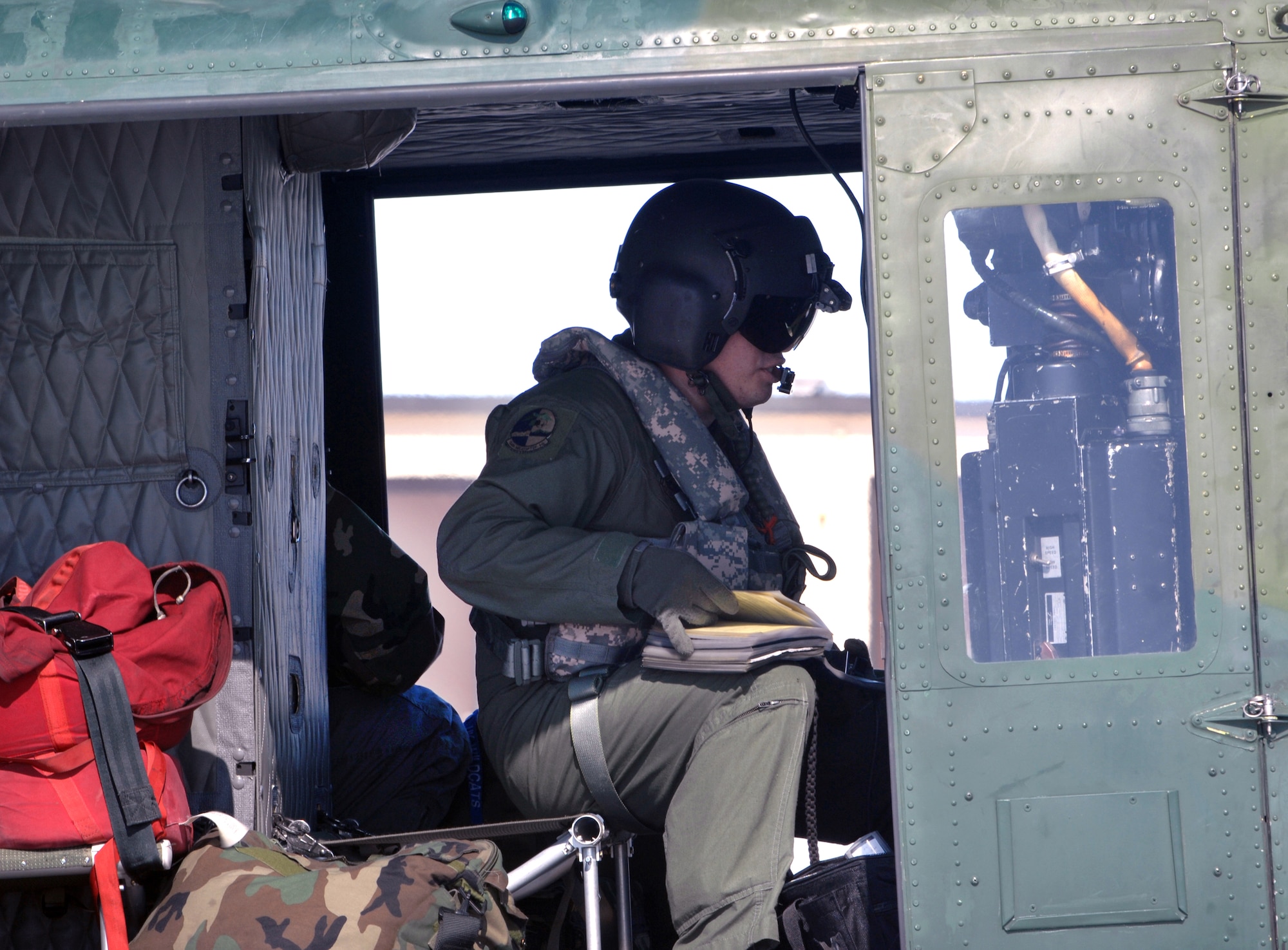 A UH-1N Huey helicopter returned to Minot Air Force Base, N.D., March 27 for a crew swap before heading to Grand Forks AFB, N.D., to assist in flood relief efforts in the Fargo area of North Dakota. Two hoist-equipped UH-1Ns from the 91st Missile Wing from Minot AFB are part of an interagency task force providing search and rescue and support services in flood-affected areas of North Dakota. (U.S. Air Force photo/Airman 1st Class Jesse Lopez) 
