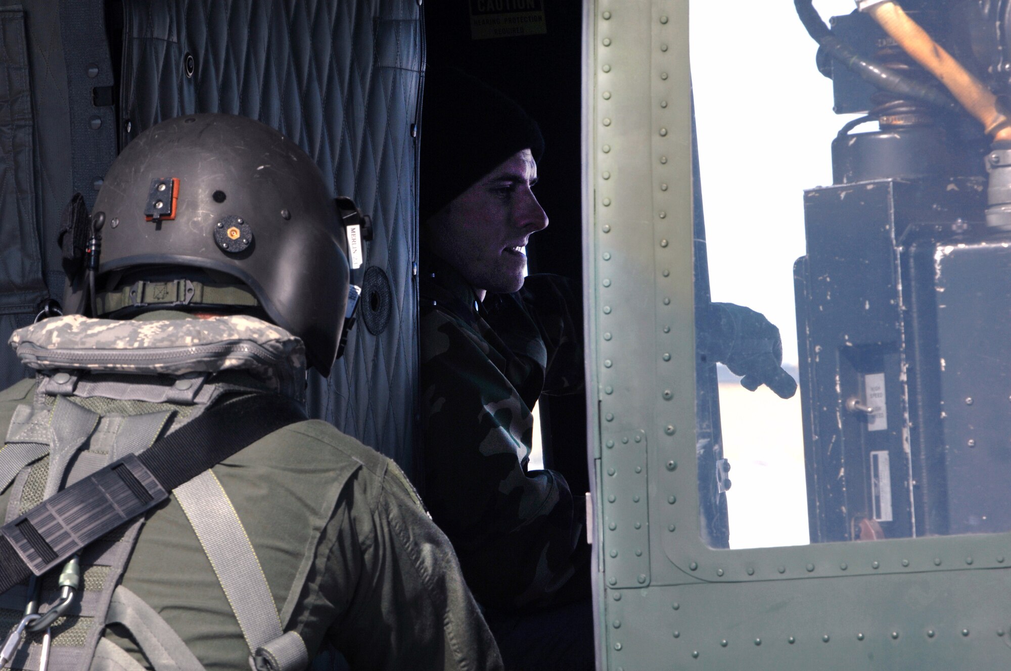 A UH-1N Huey helicopter returned to Minot Air Force Base, N.D., March 27 for a crew swap before heading to Grand Forks AFB, N.D., to assist in flood relief efforts in the Fargo area of North Dakota. Two hoist-equipped UH-1Ns from the 91st Missile Wing from Minot AFB are part of an interagency task force providing search and rescue and support services in flood-affected areas of North Dakota. (U.S. Air Force photo/Airman 1st Class Jesse Lopez) 
