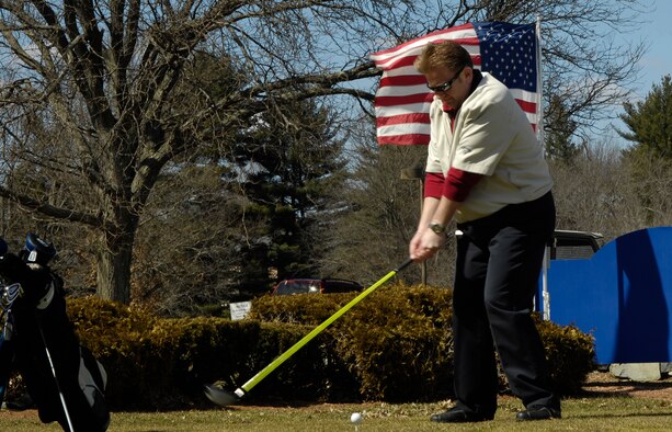 HANSCOM AIR FORCE BASE, Mass. –Chief Master Sergeant Michael McCoy, 66th Mission Support Group superintendent, works on his swing at the Patriot Golf Course March 24. The course will open for business on April 10, for more information on events and activities taking place at the Patriot Golf Course call (781) 687-2396. (U.S. Air Force photo by Linda LaBonte Britt)