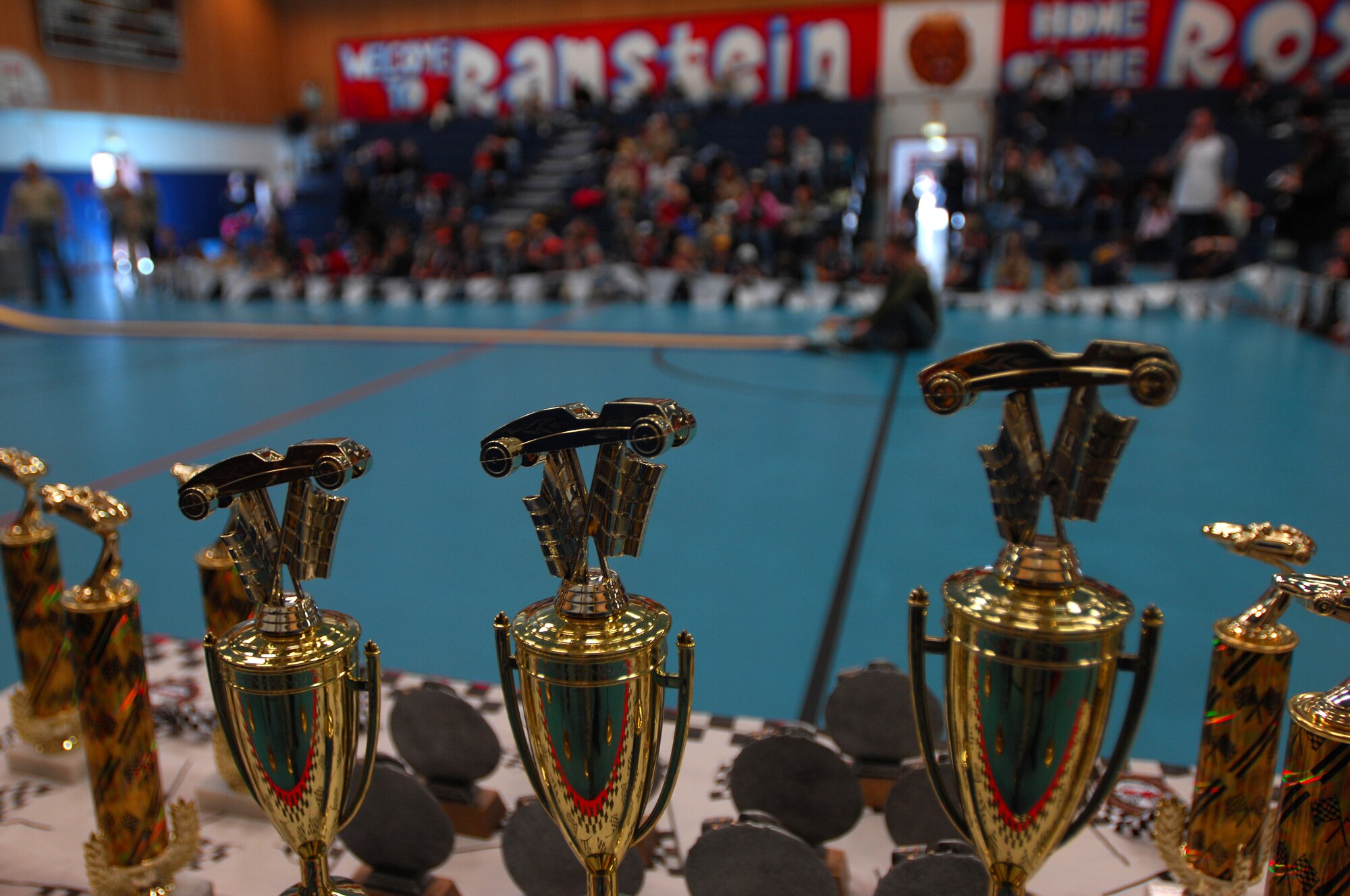 Trophies are on display at the Cub Scout District Level Pinewood Derby contest, March 19, 2009 at the Ramstein High School gym. The pinewood derby encourages scouts to learn and improve on their craftsmanship and practice good sportsmanship. (U.S. Air Force photo by Airman 1st Class Kenny Holston)