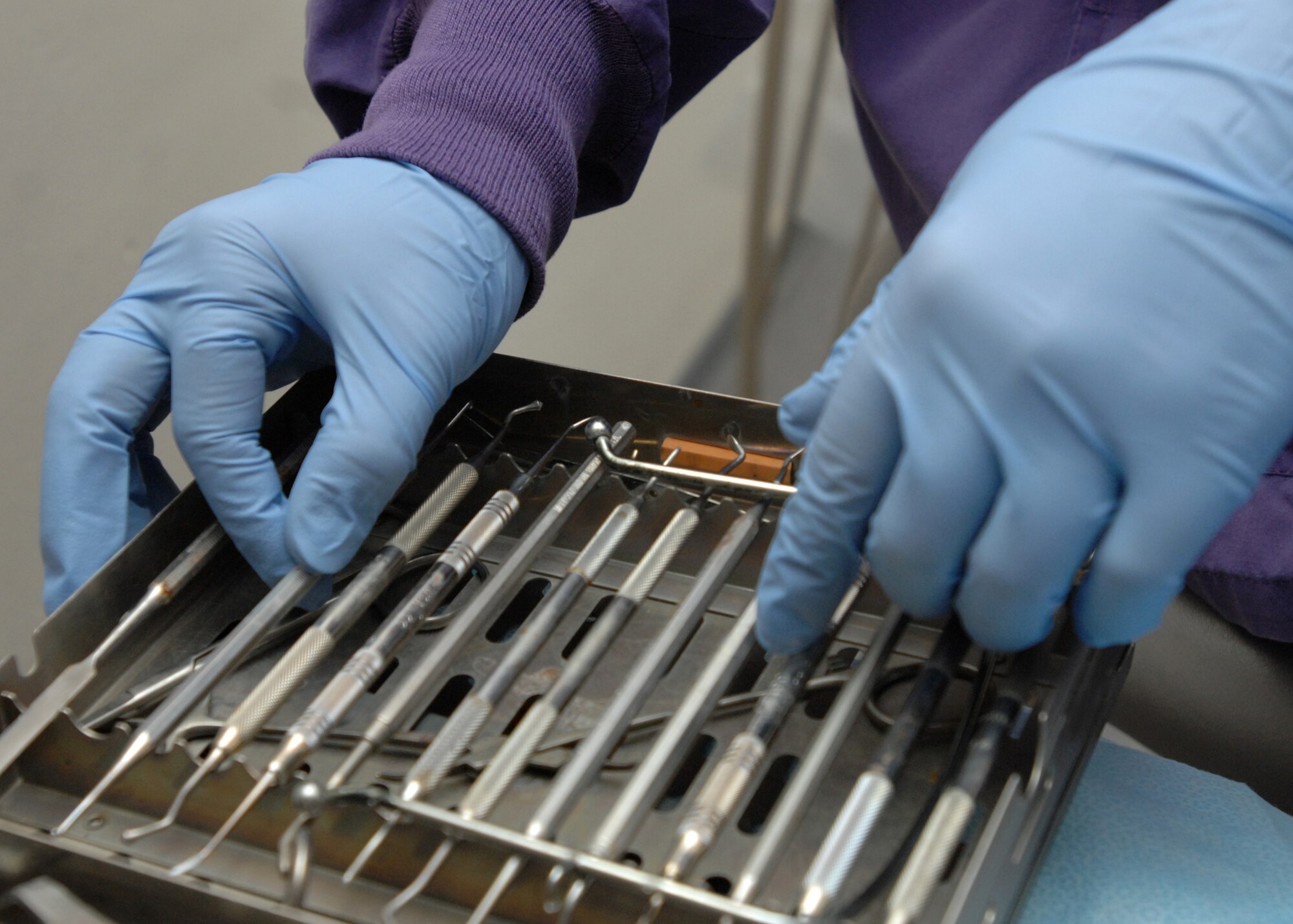 SPANGDAHLEM AIR BASE, Germany -- Airman 1st Class Danielle Kinder, 52nd Dental Squadron, organizes dental tools March 27, 2009. Airman Kinder is the 52nd Fighter Wing's Top Saber Performer for the week of April 3-9. (U.S. Air Force photo by Senior Airman Jenifer H. Calhoun)