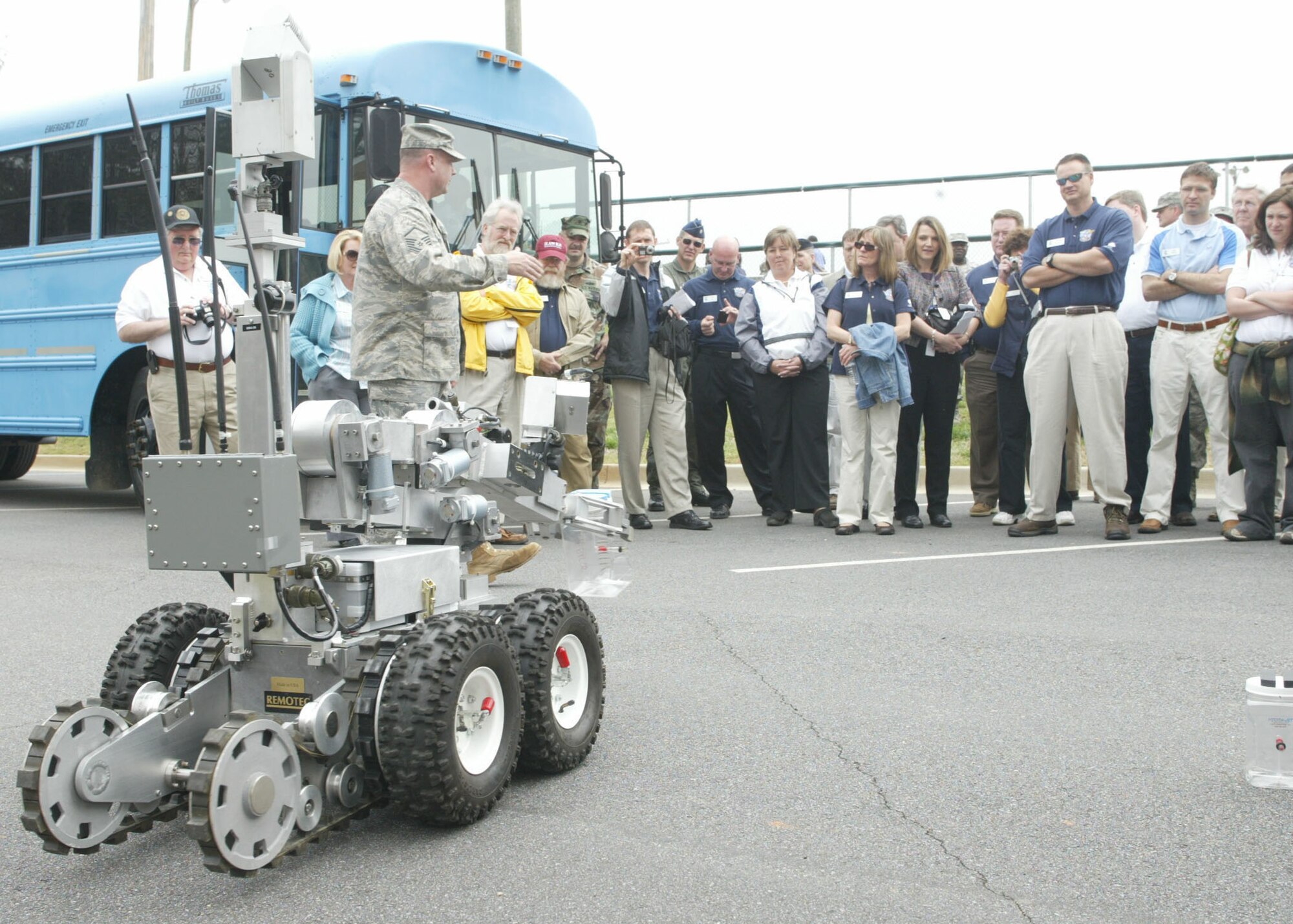 Dobbins Air Reserve Base, Ga. - Master Sgt. Brad McKinney, 94th Civil Engineering Squadron, Explosive Ordinance Flight chief, demonstrates the versatility of the Remotec ANDROS F6A Robot (Randy) for the visiting Honorary Commanders Group touring Dobbins Air Reserve Base on March 24. (U.S. Air Force photo/Don Peek)