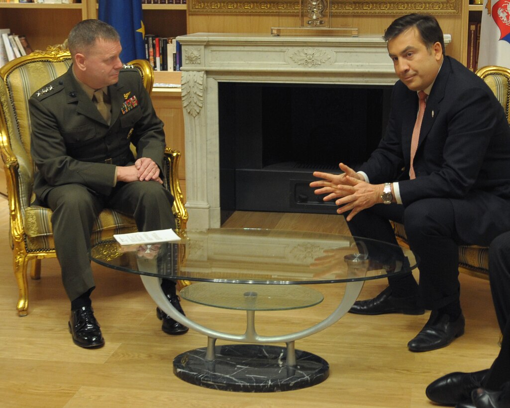 U.S. Marine Gen. James E. Cartwright, vice chairman of the Joint Chiefs of Staff, listens to Georgian President Mikheil Saakashvili at the presidential palace in Tbilisi, Georgia, March 30, 2009.