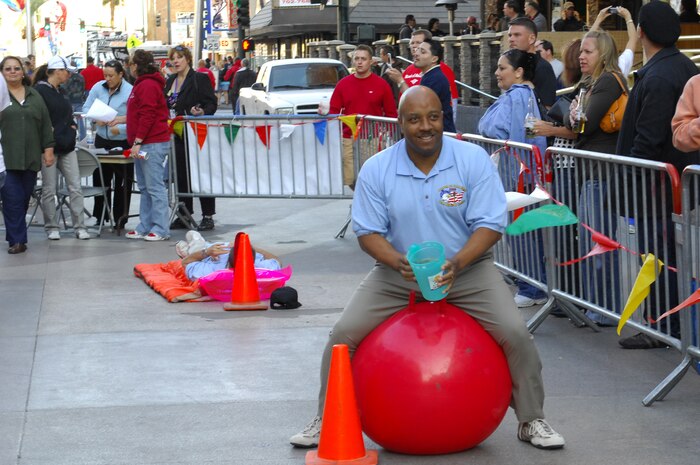 Chief Master Sgt. Vernon Boardley, 99th Mission Support Group superintendent, waits for the starting whistle during the Corporate Challenge 2009 Executive Relay held at the Freemont Street Experience March 26.  The 2009 City of Las Vegas Corporate Challenge, sponsored by the Las Vegas Parks and Recreation Department, takes place March 25 to June 13.  (U.S Air Force photo by Staff Sgt. Taylor Worley) (Released)