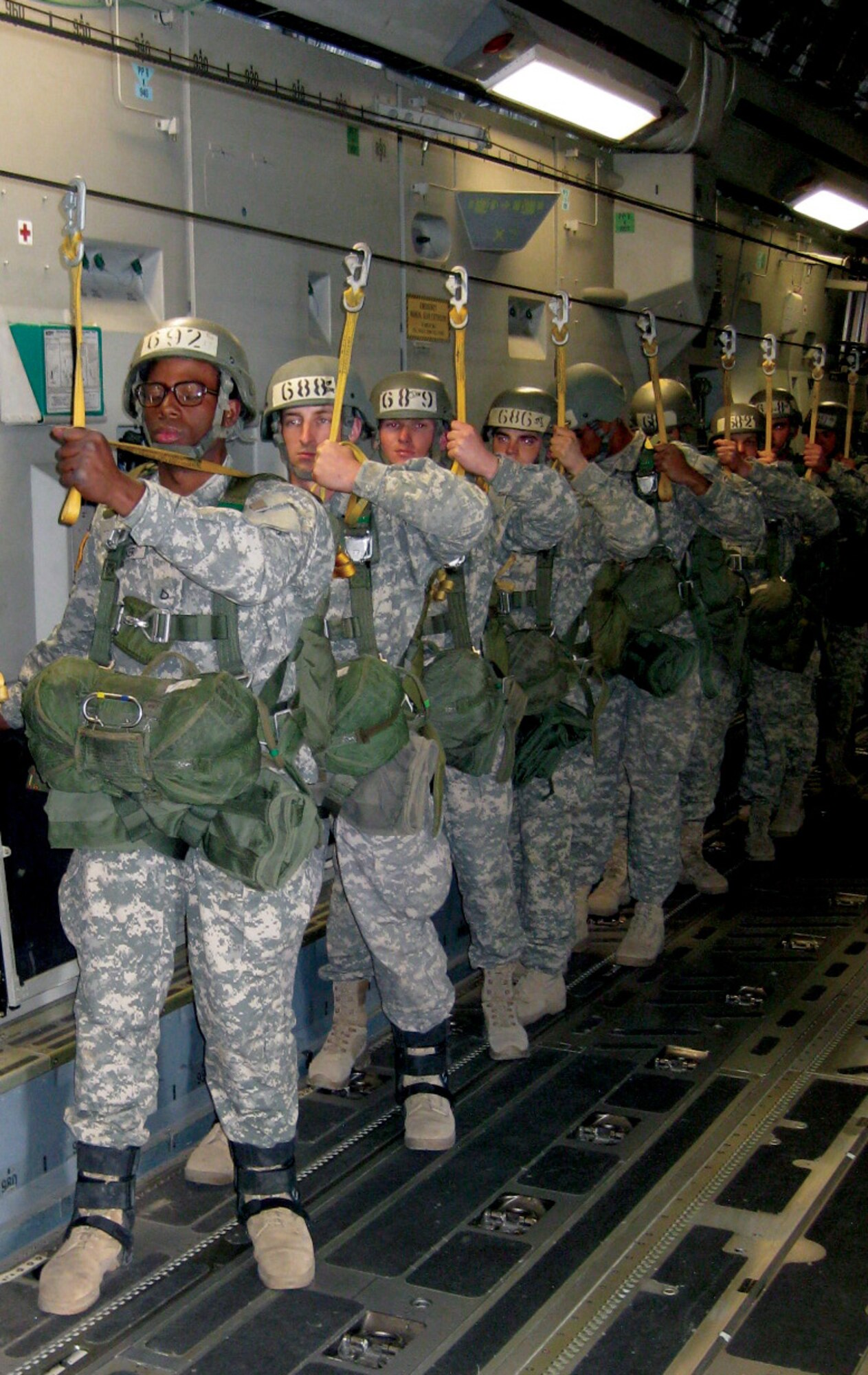 Students in the Army's Basic Airborne Course, Fort Benning, Ga., prepare to make a jump from a Reserve-flown C-17 from McChord Air Force Base, Wash.  A crew mix from all three C-17 squadrons in the 446th Airlift Wing provided critical support to the soldiers as they made five jumps in three days in order to qualify for graduation. (U.S. Air Force photo/Senior Master Sgt. John Vujovich)