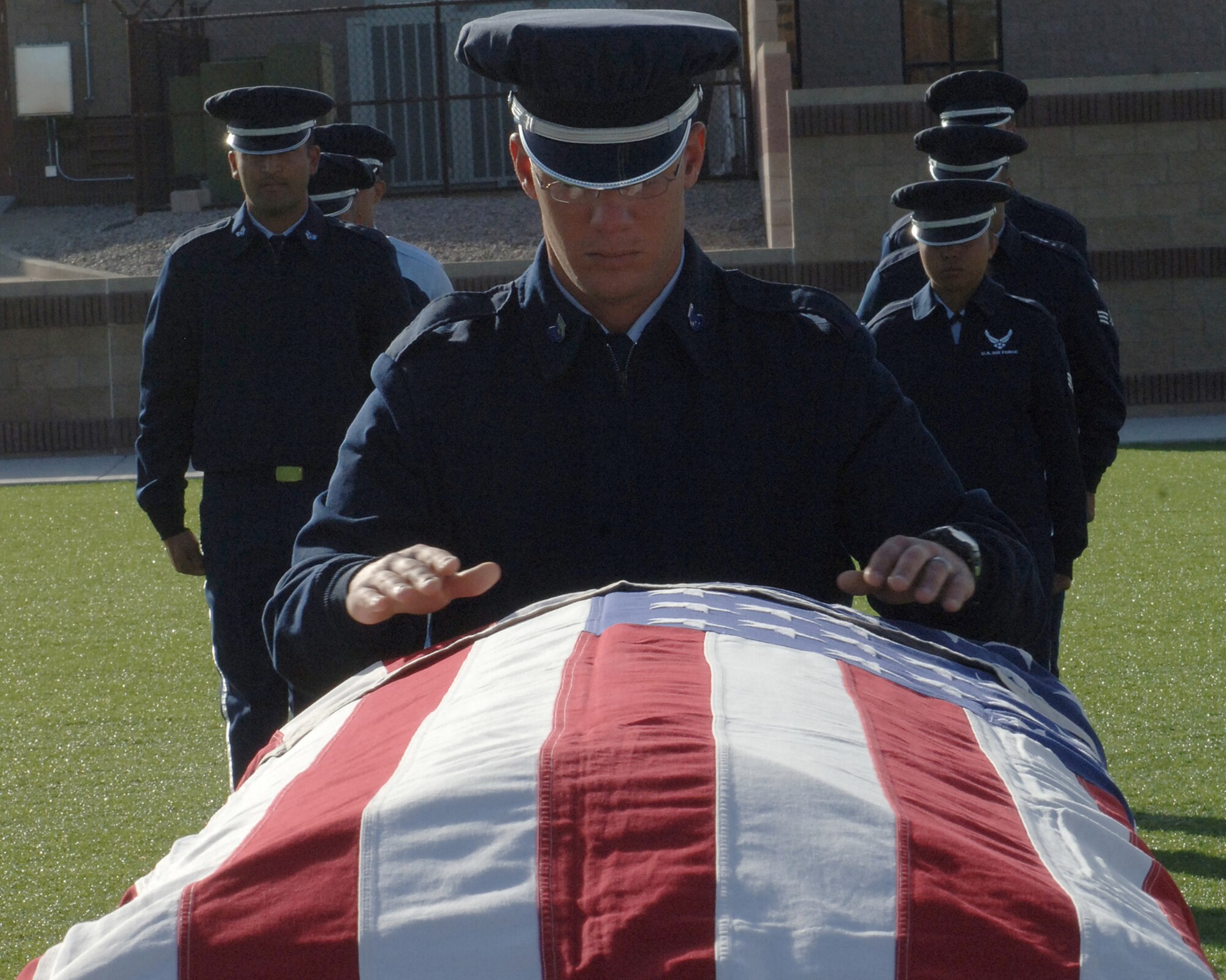 Members of the Holloman Air Force Base Honor Guard conduct a final practice for their graduation ceremony March 25. The Airmen were instructed by members of the USAF Honor Guard during a week long training course. 