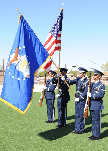 Members of the Holloman Air Force Base Honor Guard present the colors during an honor guard graduatoin ceremony March 25. The base honor guard spent a week training with instructors from the USAF Honor Guard from Bolling Air Force Base.