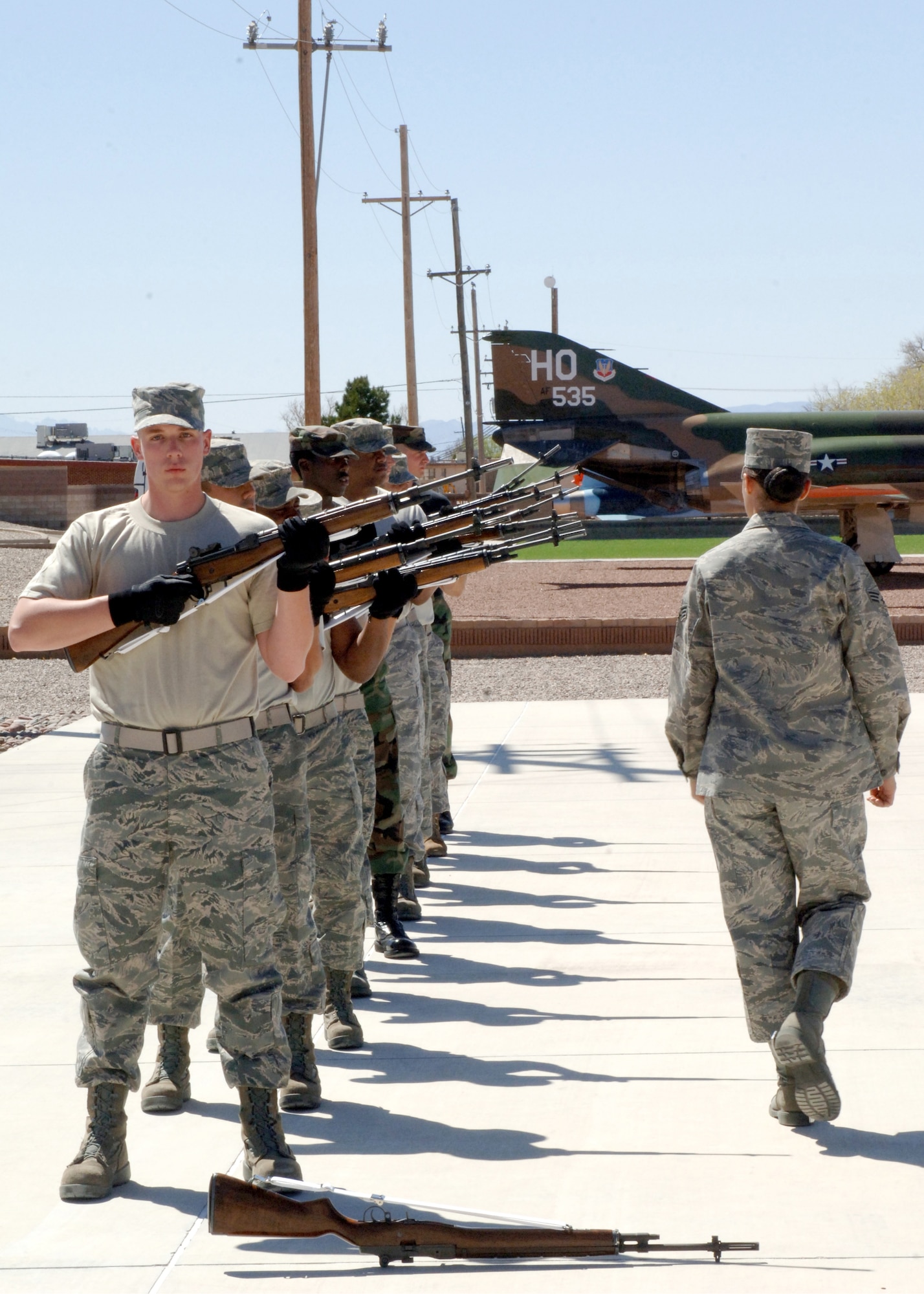 Senior Airman Krystie Martinez of the Air Force Honor Guard instructs members of the Holloman Honor Guard March 17. Airman Martinez is one of three members of the Air Force Honor Guard who visited Holloman for a week long training course. 