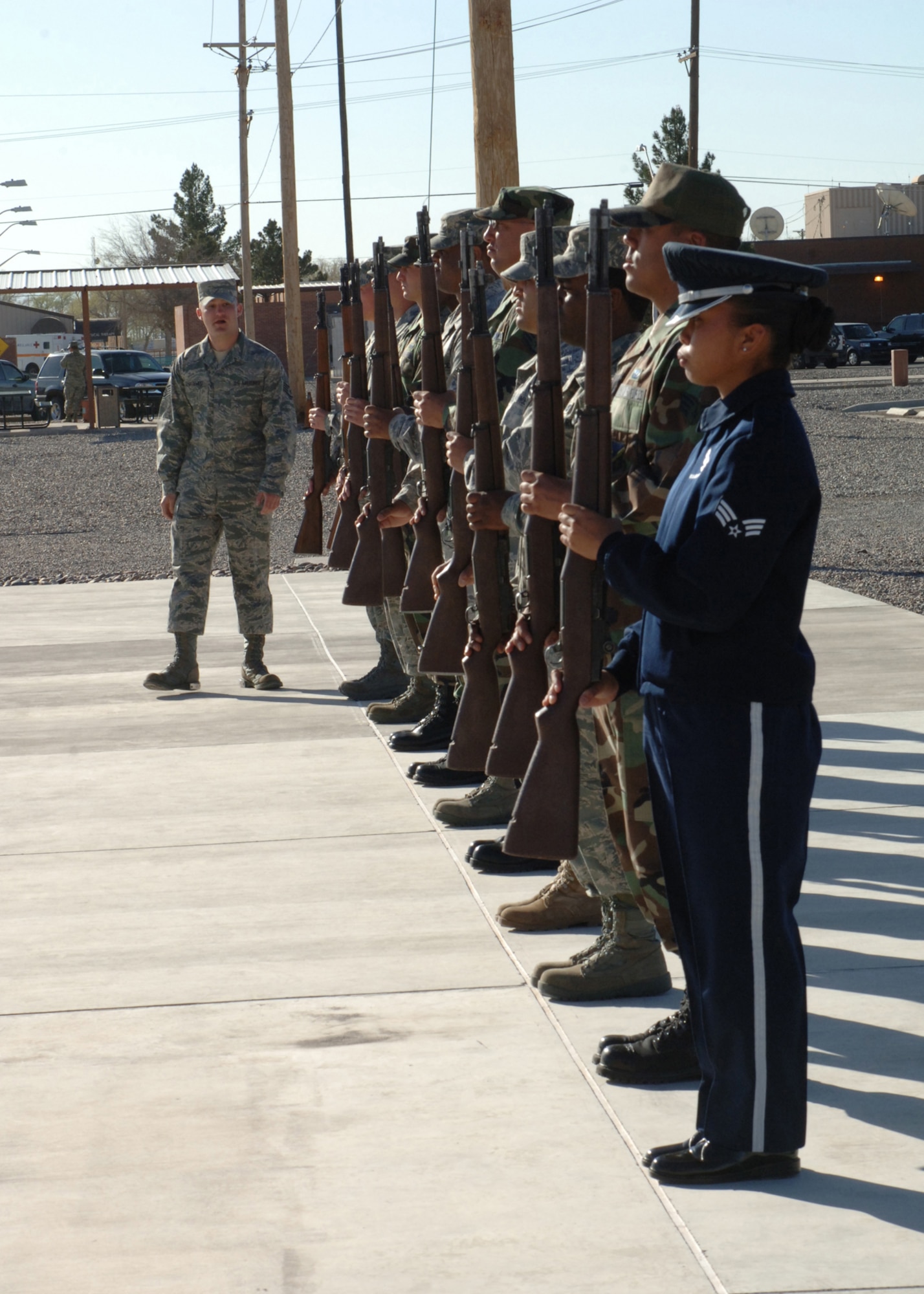 Staff Sgt. Chris Cenatiempo conducts training at the Holloman Air Force Base Honor Guard Drill Pad March 17. Sergeant Cenatiempo is one of three Air Force Honor Guard members who came to Holloman for a week long honor guard training course.