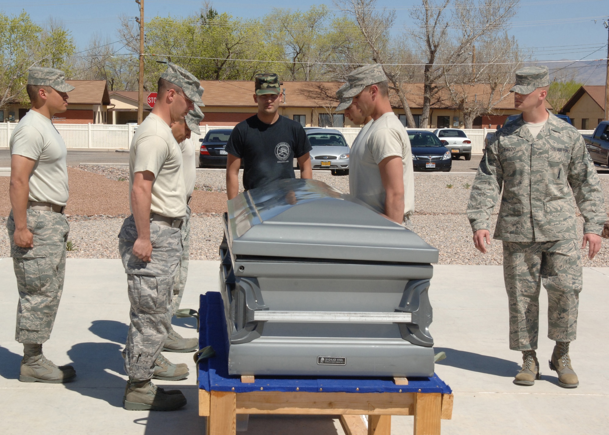 Staff Sergeant Alex Frizzo, an instructor with the Air Force Honor Guard, teaches members of the Holloman AFB Honor Guard proper techniques for body bearers March 17. The Air Force Honor Guard  periodically sends instructors to teach base honor guards proper procedures and instructions.  