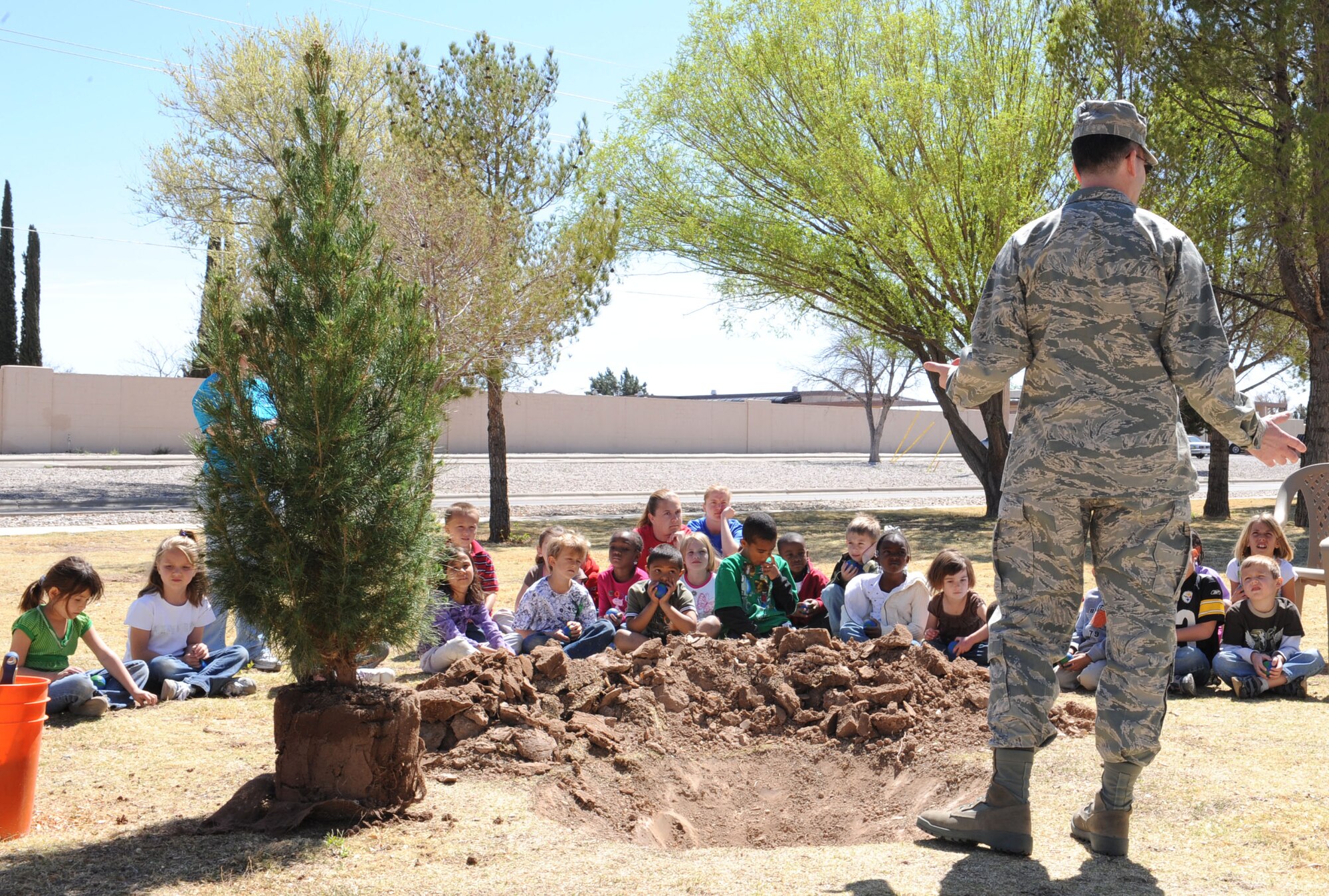 Col. Stephen DiFonzo, 49th Mission Support Group Commander, explains the importance of Arbor Day, March 23, at Holloman Air Force Base, N.M. Arbor Day has been celebrated by Holloman for the past six years. (U.S. Air Force photo/Airman 1st Class Rachel Kocin)