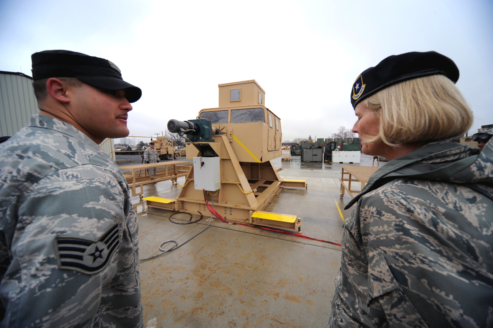 Staff Sgt. Eric Bergery, 421st Combat Training Squadron, talks with Brig. Gen. Mary Kay Hertog, Air Force Director of Security Forces at the Pentagon, during General Hertog's visit to the U.S. Expeditionary Center on Fort Dix, N.J., on March 26, 2009.  General Hertog also gave a presentation for the Expeditionary Center's Professional Development Speaker Series observing the center's 15th anniversary.  The speaking engagement was also teleconferenced to 15 locations Air Force-wide to include Japan, Germany, Nevada, Texas, Illinois, Hawaii and California. (U.S. Air Force Photo/Staff Sgt. Nathan G. Bevier) 
