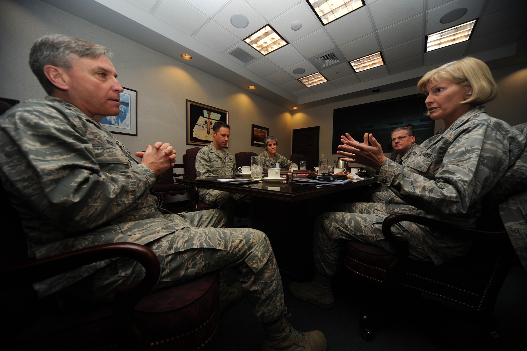 Maj. Gen. Kip Self, U.S. Air Force Expeditionary Center commander, talks with Brig. Gen. Mary Kay Hertog, Air Force Director of Security Forces at the Pentagon, during General Hertog's visit to the Expeditionary Center on Fort Dix, N.J., on March 26, 2009.  General Hertog also gave a presentation for the Expeditionary Center's Professional Development Speaker Series observing the center's 15th anniversary.  The speaking engagement was also teleconferenced to 15 locations Air Force-wide to include Japan, Germany, Nevada, Texas, Illinois, Hawaii and California. (U.S. Air Force Photo/Staff Sgt. Nathan G. Bevier) 