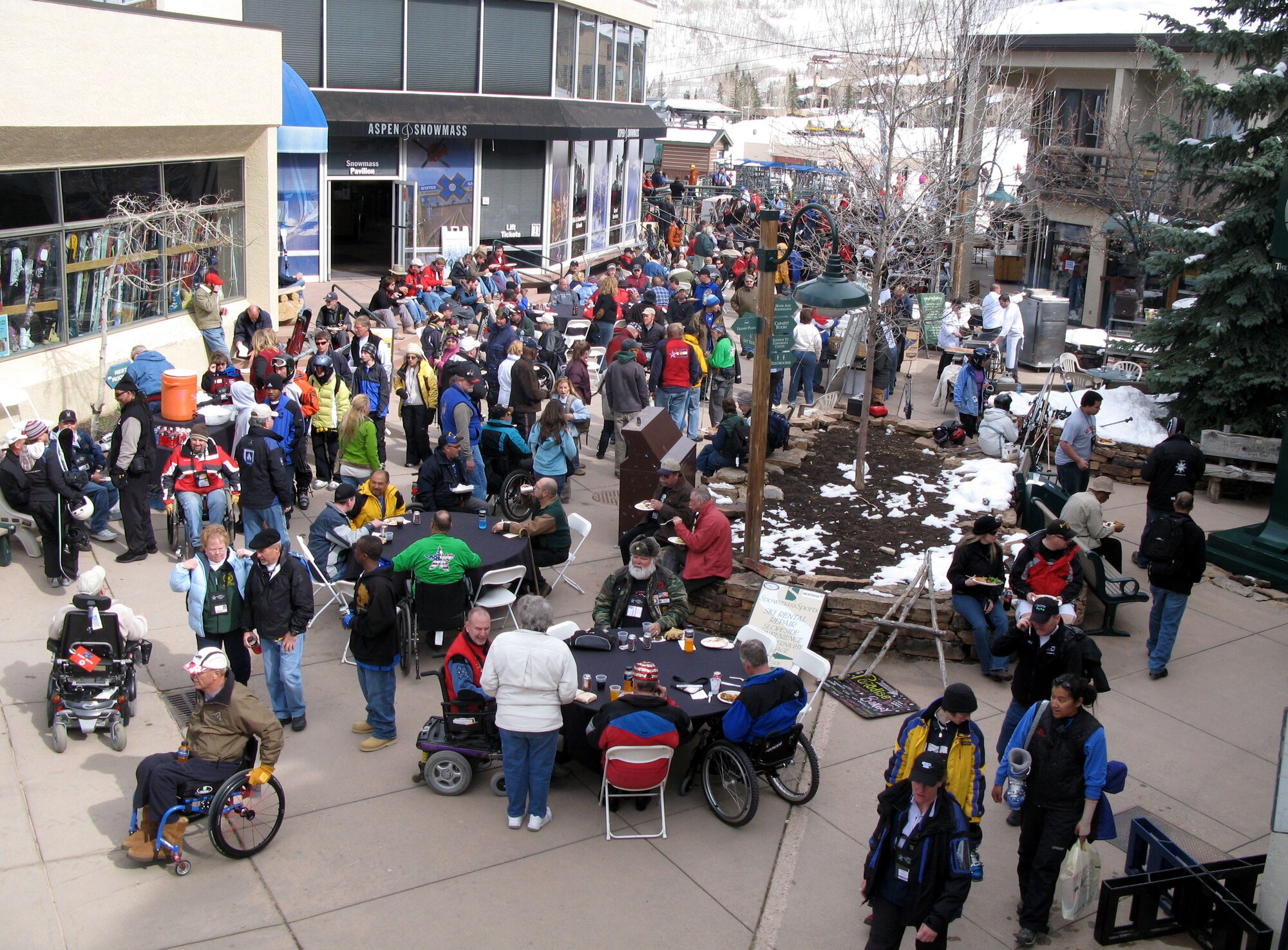Participants in the 23rd annual National Disabled Veterans Winter Sports Clinic are welcomed to Snowmass Village, Colo., March 29 with an opening-day "Taste of Aspen" celebration. (Defense Department photo/Donna Miles)