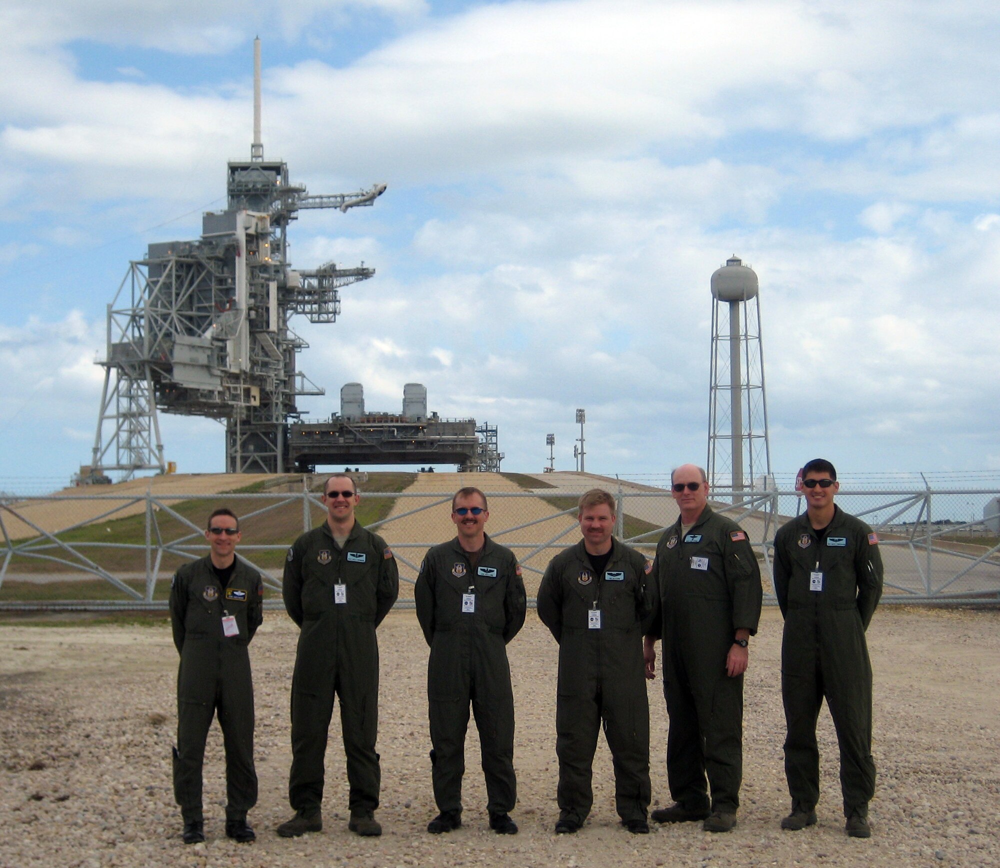 A Dover Air Force Base, Del., Air Force Reserve aircrew with the 326th Airlift Squadron picked up an ExPRESS Logistics Carrier at Andrews Air Force Base, Md., March 21 and flew it to the Kennedy Space Center, Fla., for transport to the International Space Station via the Space Shuttle this fall. ELCs are unpressurized facilities attached to the ISS and are used for science experiments, storage devices and for electrical power. The crew was, from left to right, Col. Rob Shepherd, 512th Operations Group deputy commander, Master Sgt. Eric Weinmann, 326th Airlift Squadron loadmaster, Capt. Jon Holland, 326th AS pilot, Capt. Jim McCann, 326th AS pilot, Master Sgt. Bill Byrne, 326th loadmaster, and Airman 1st Class Marc Anderson, 326th AS loadmaster. (U.S. Air Force photo)